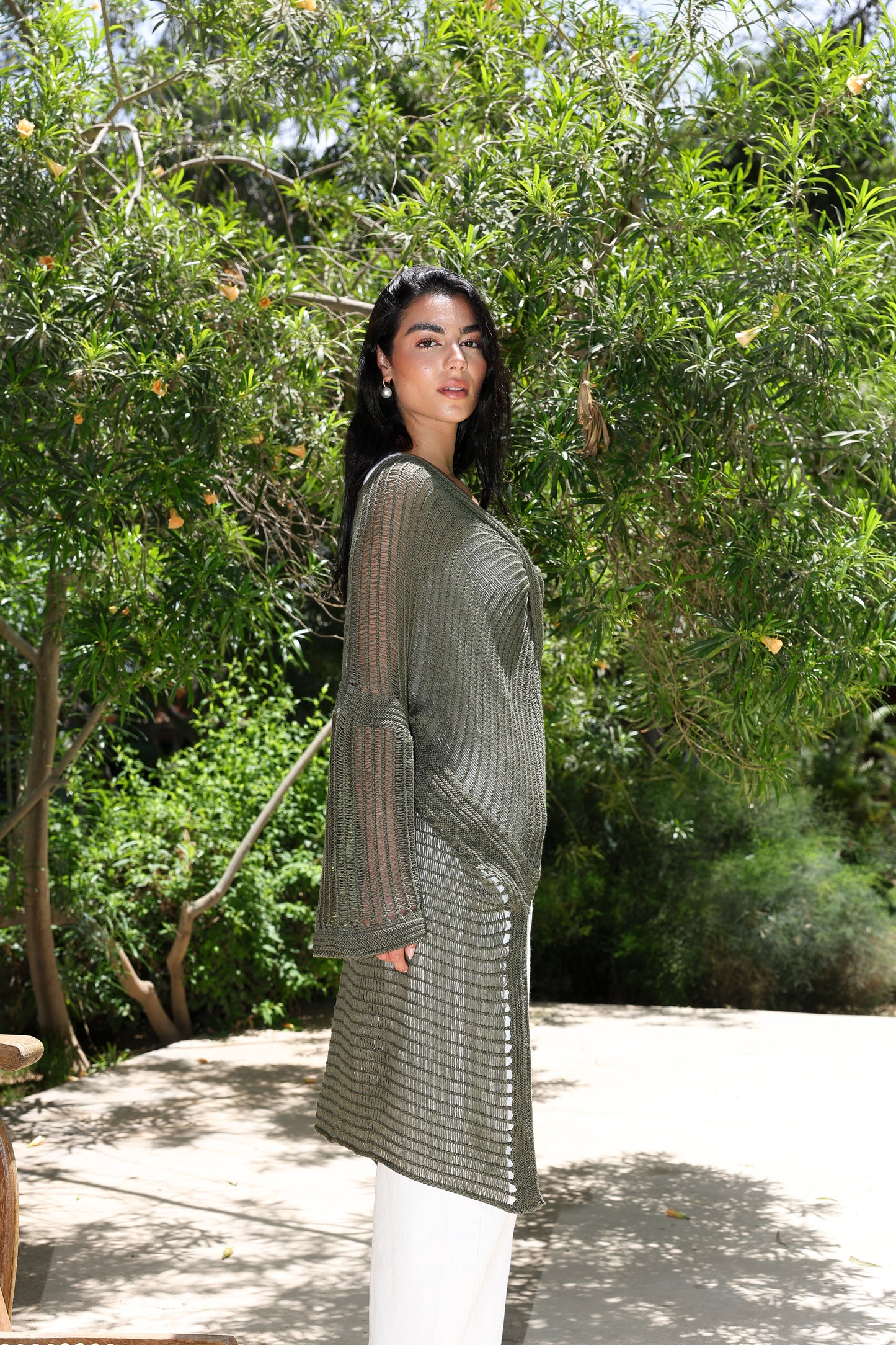 Convoluted high and low knitted top