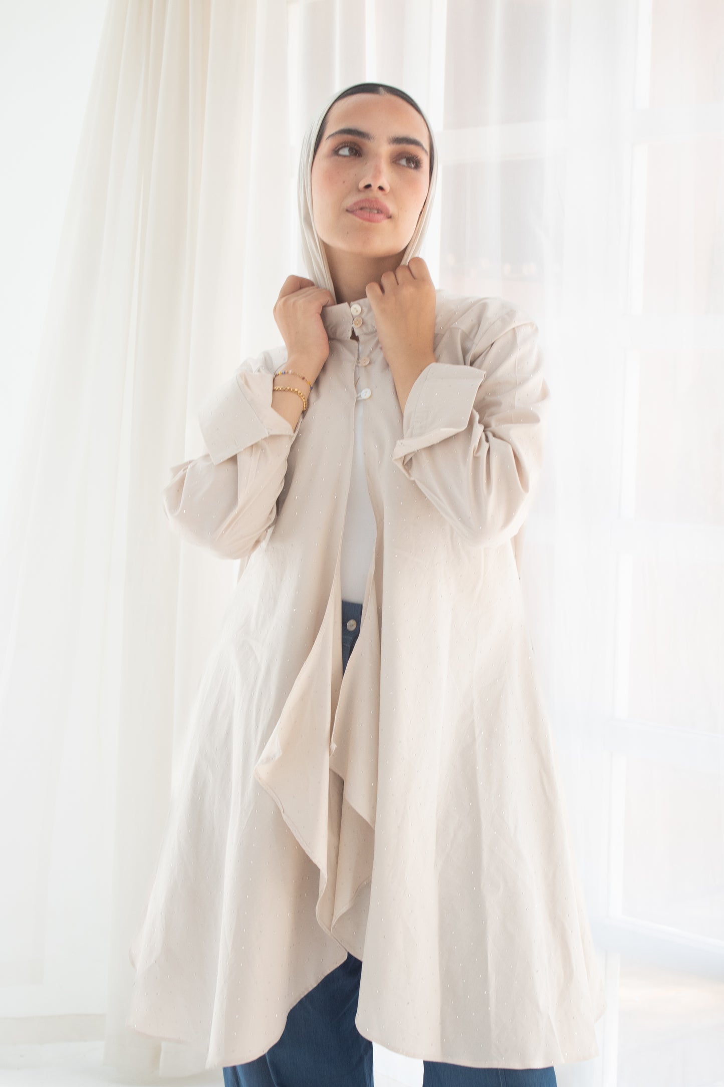 Beige studded poplin circuitous blouse