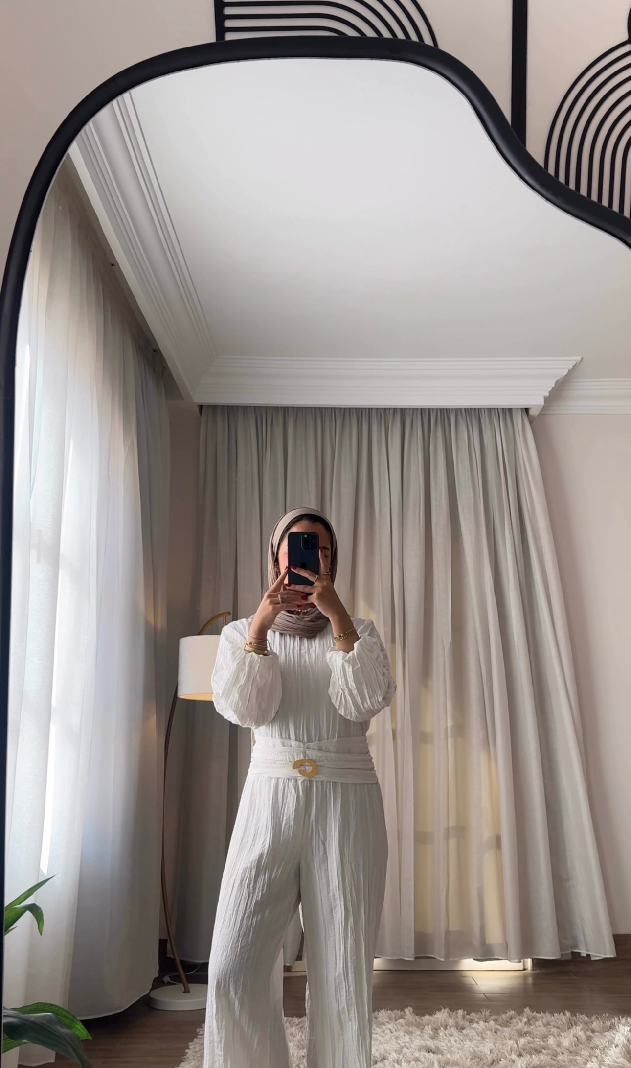 Shimmered crashed cotton jumpsuit in white golden brooch