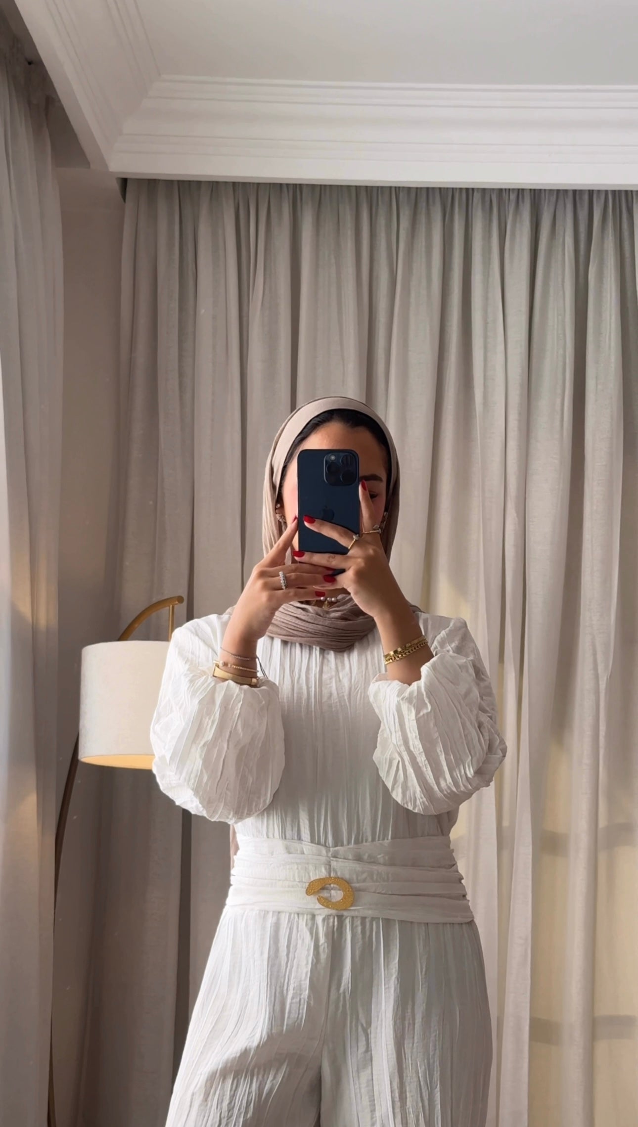 Shimmered crashed cotton jumpsuit in white golden brooch