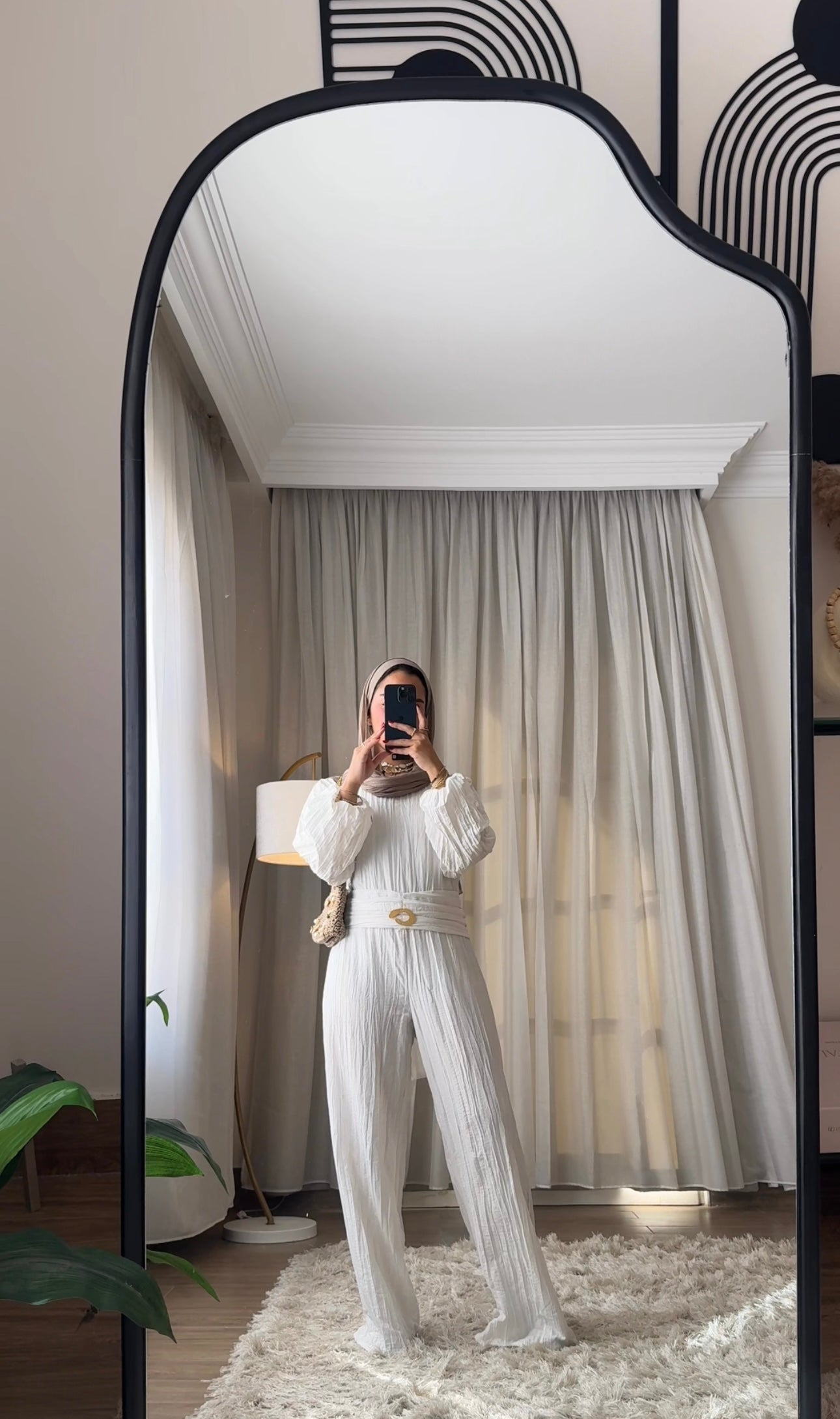 Shimmered crashed cotton jumpsuit in white golden brooch