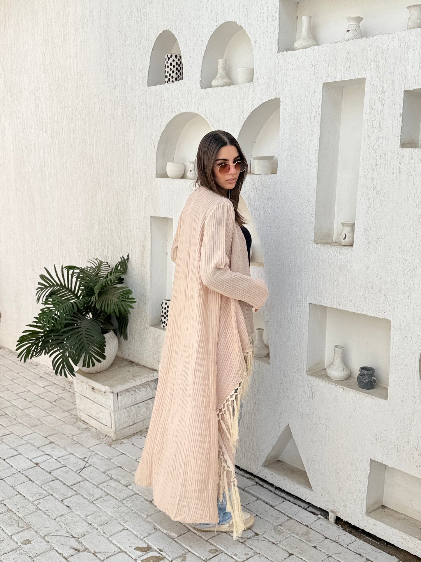 Beige cardigan with fringes
