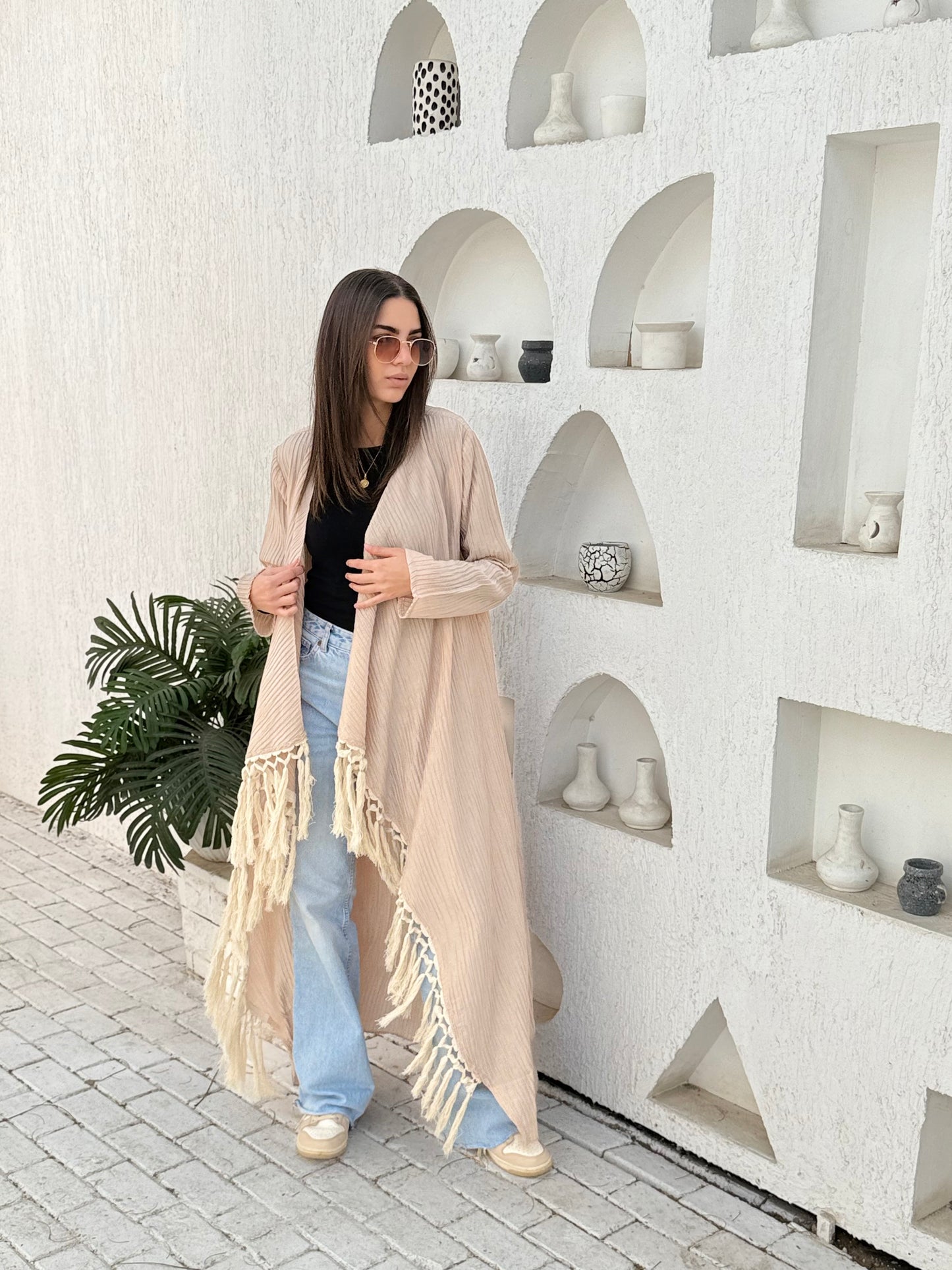 Beige cardigan with fringes
