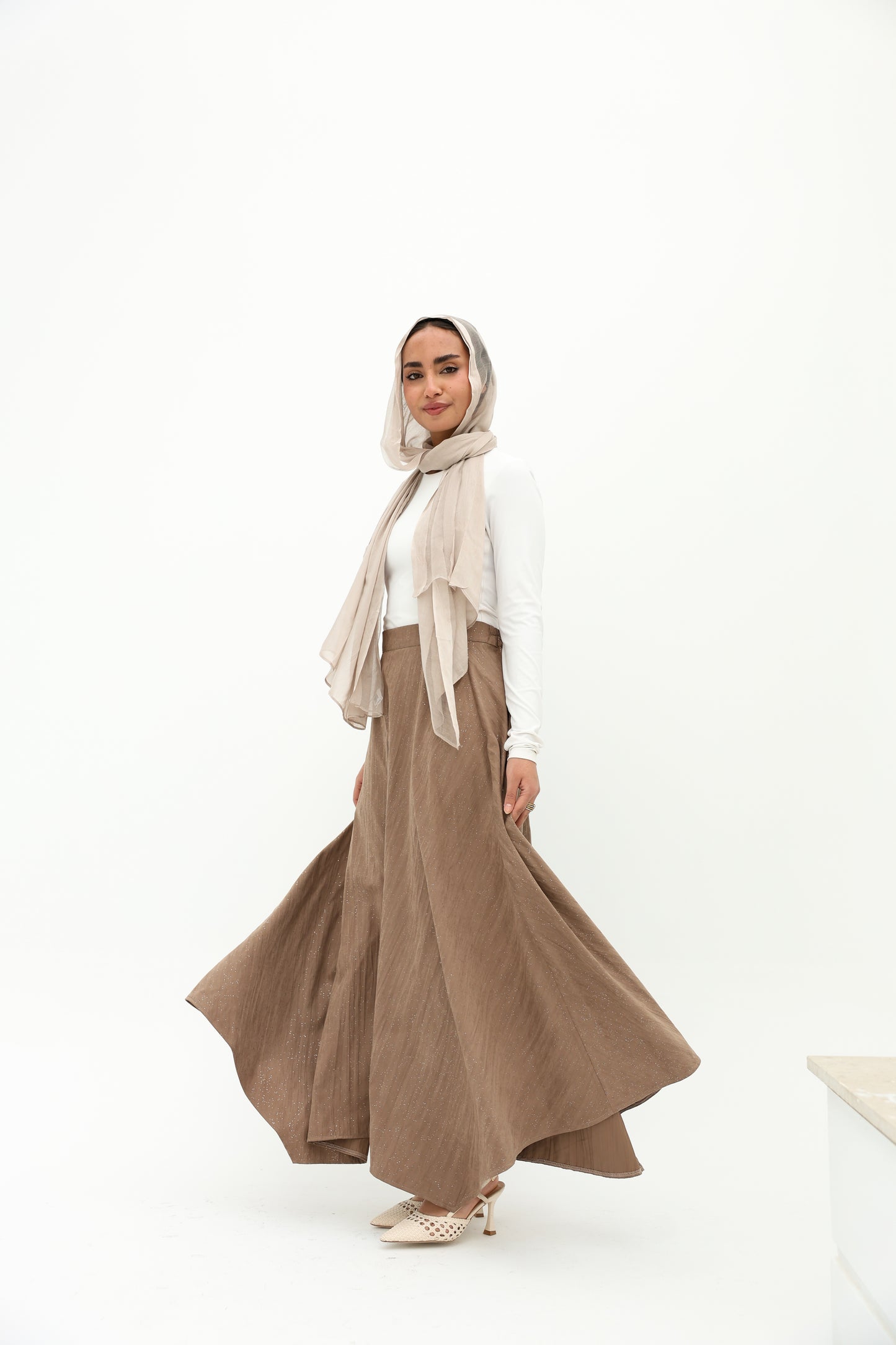 Crushed skirt in shimmered mocha تنورة بكسرات بلون الموكا بلمعة خفيفه
