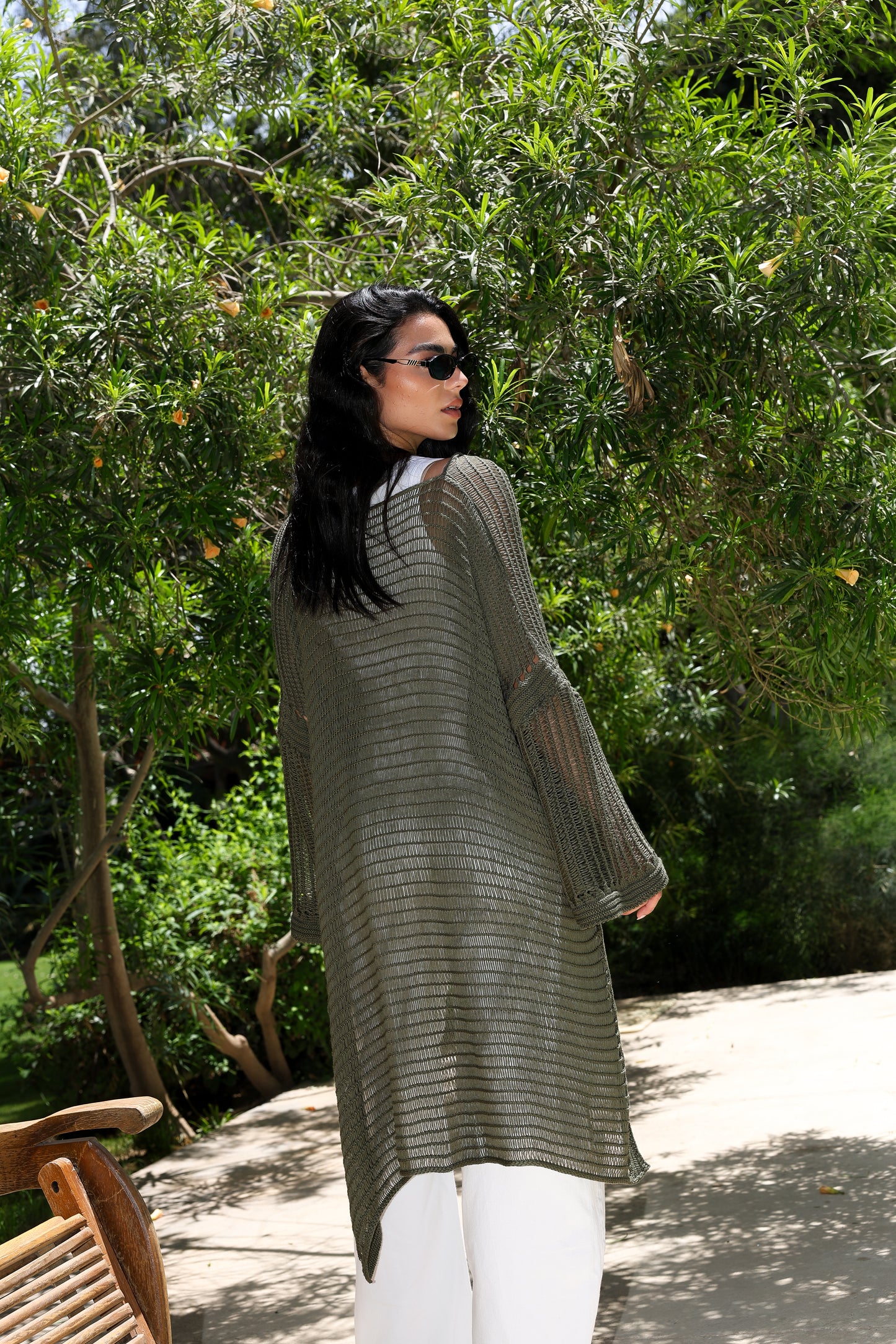 Convoluted high and low knitted top