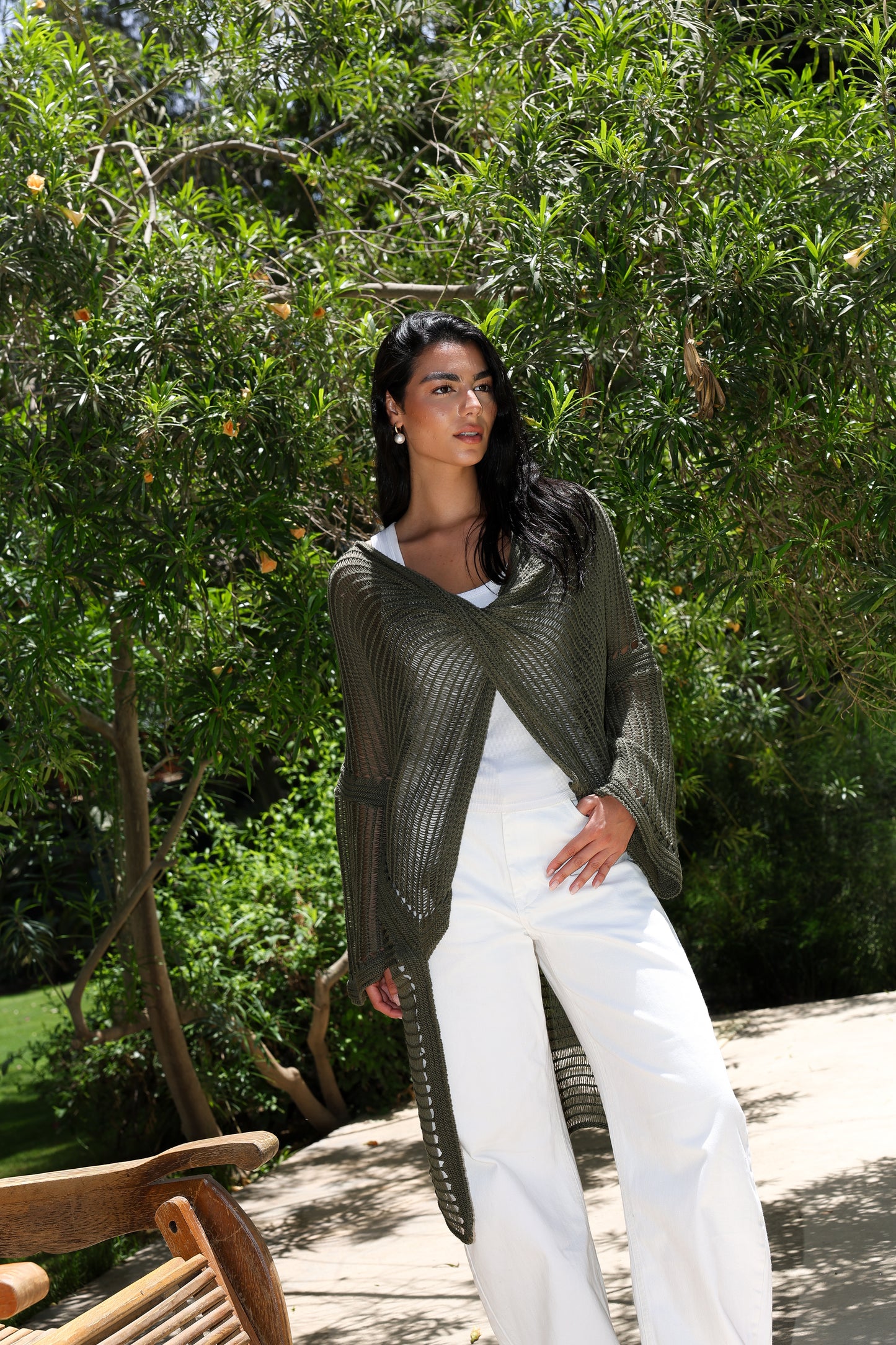 Convoluted high and low knitted top