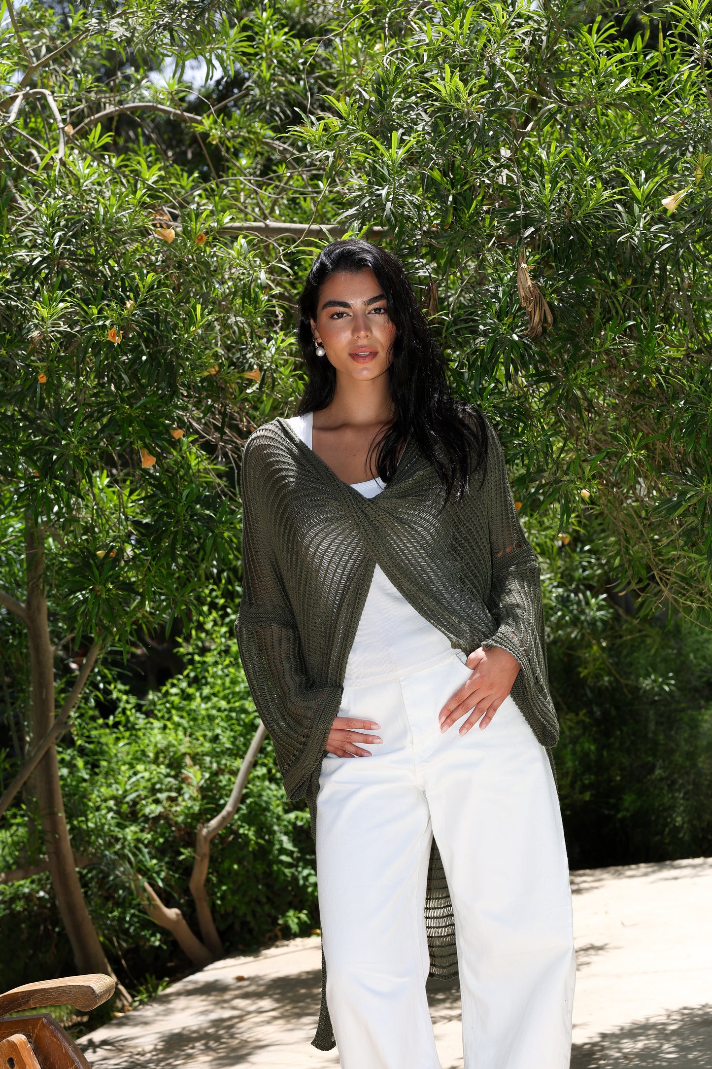 Convoluted high and low knitted top