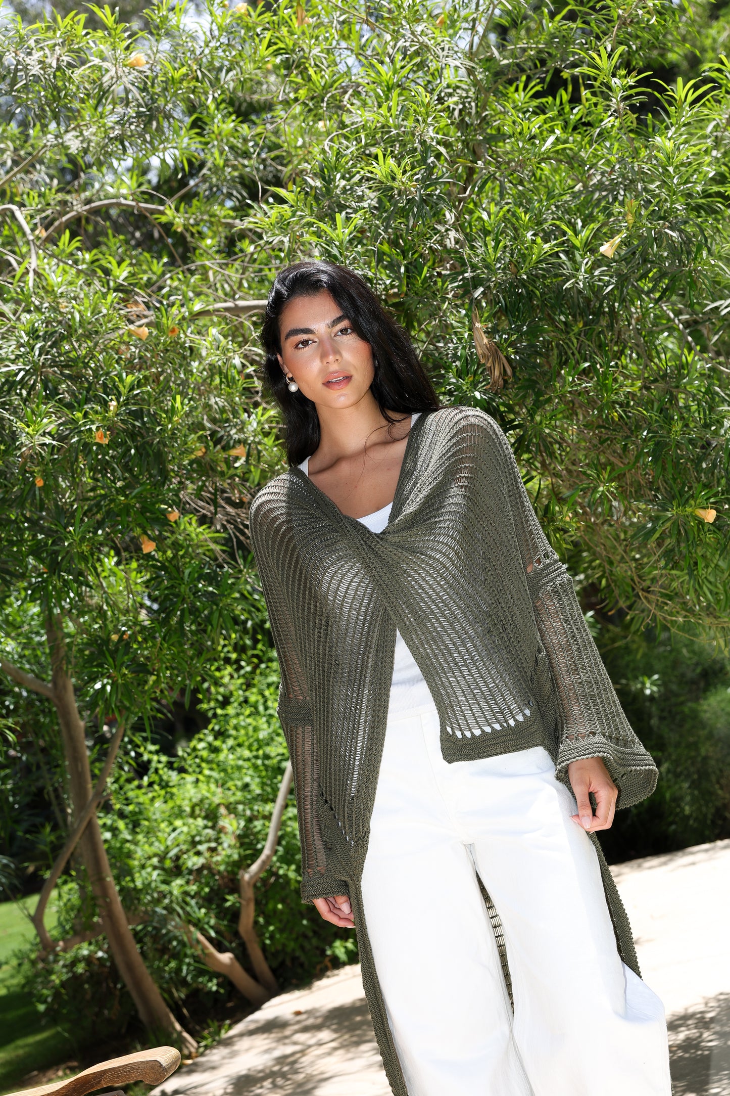 Convoluted high and low knitted top
