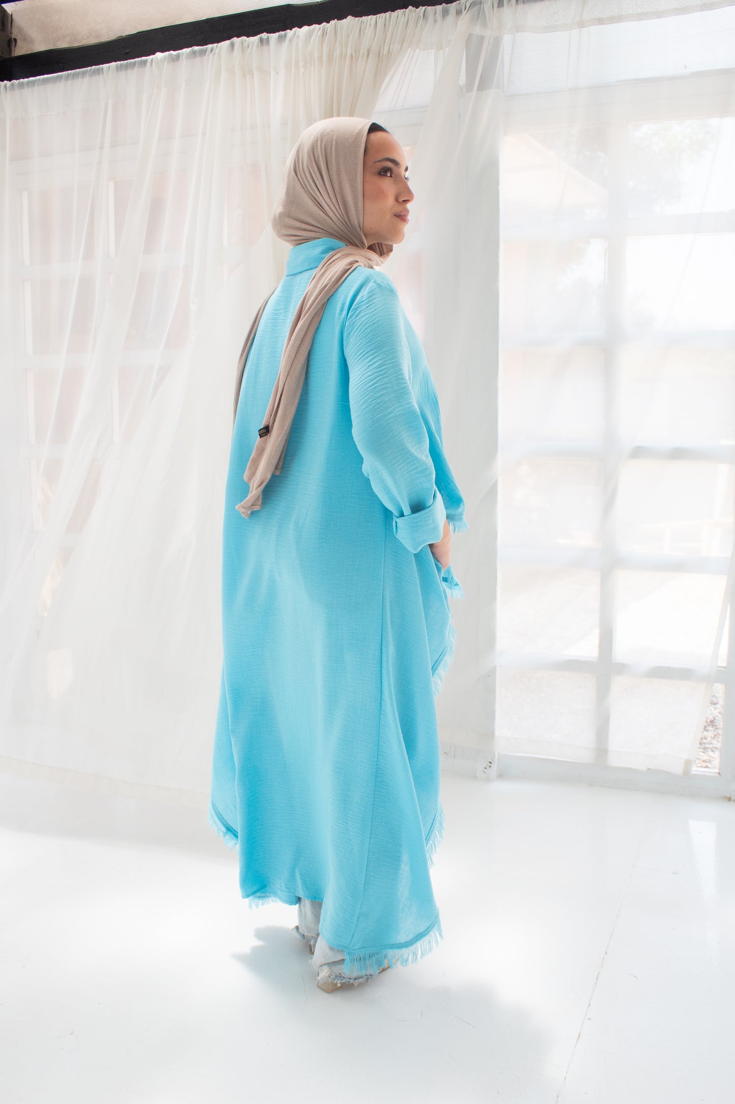 Boho high and low linen blouse in turquoise