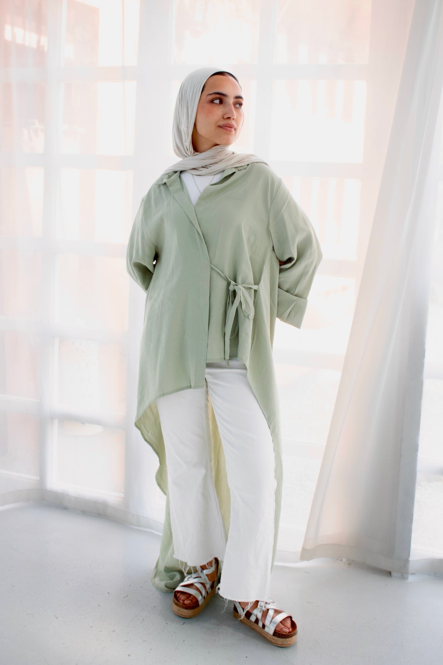 Remo mint green high and low blouse