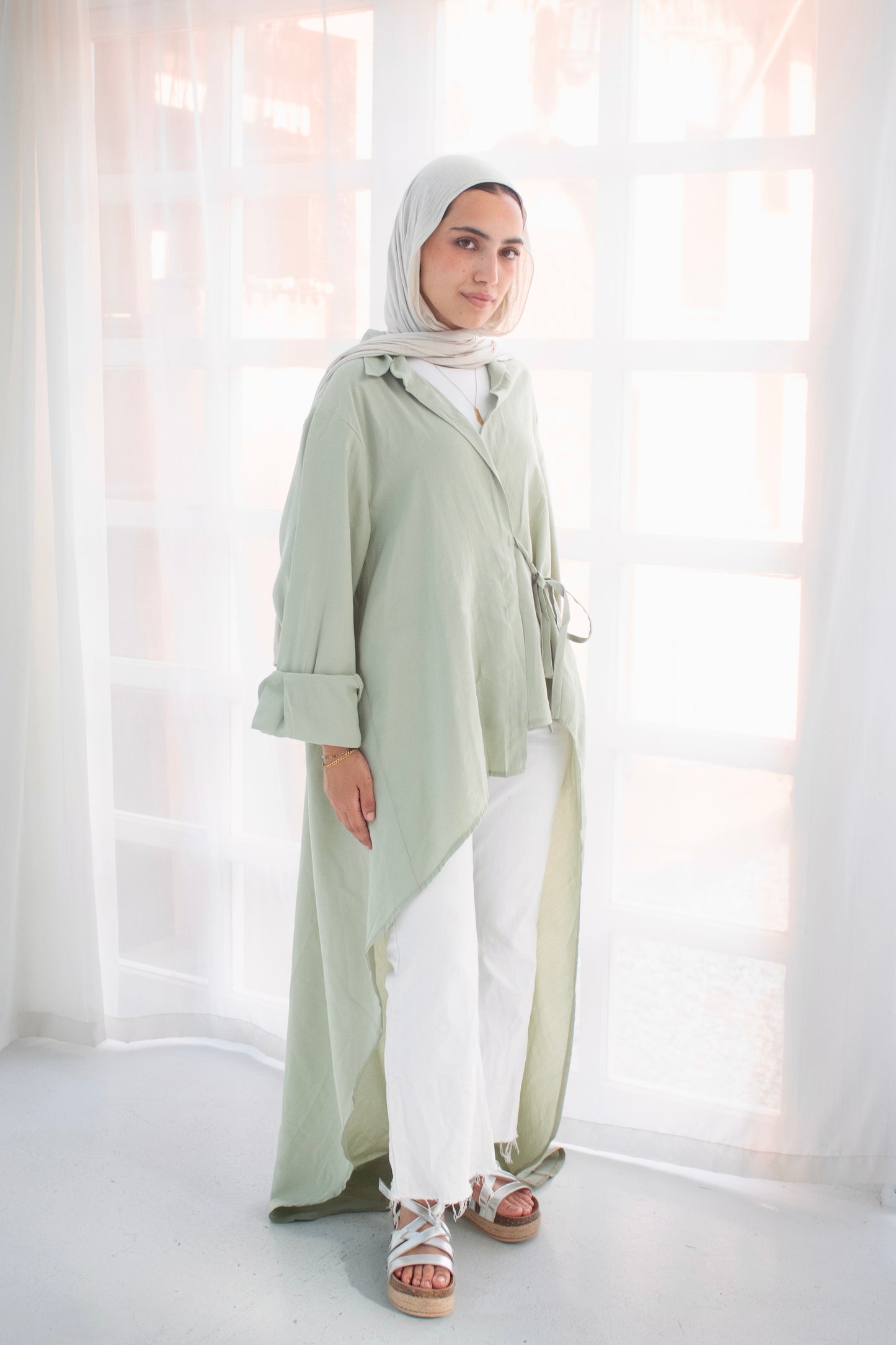 Remo mint green high and low blouse