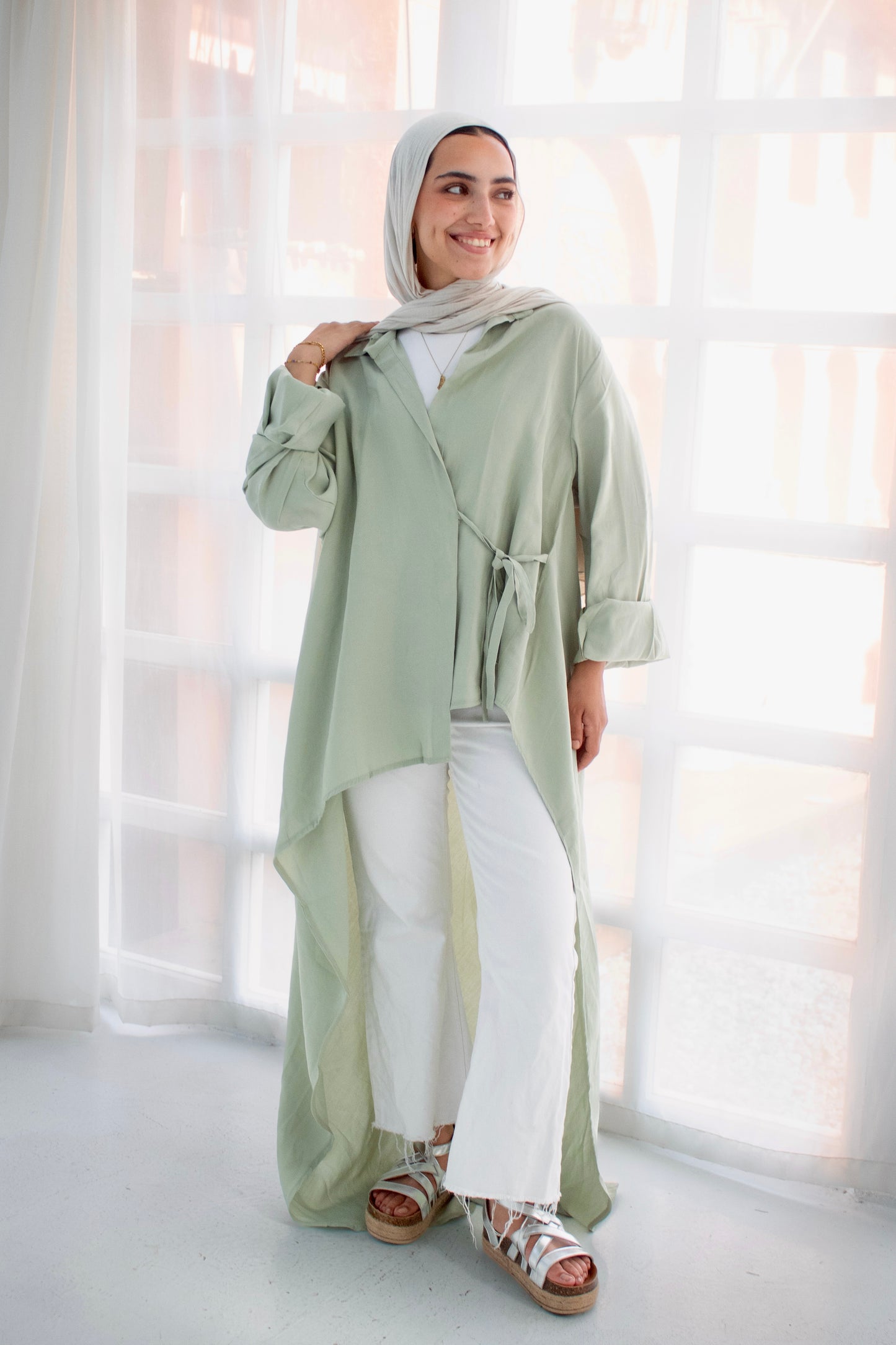 Remo mint green high and low blouse