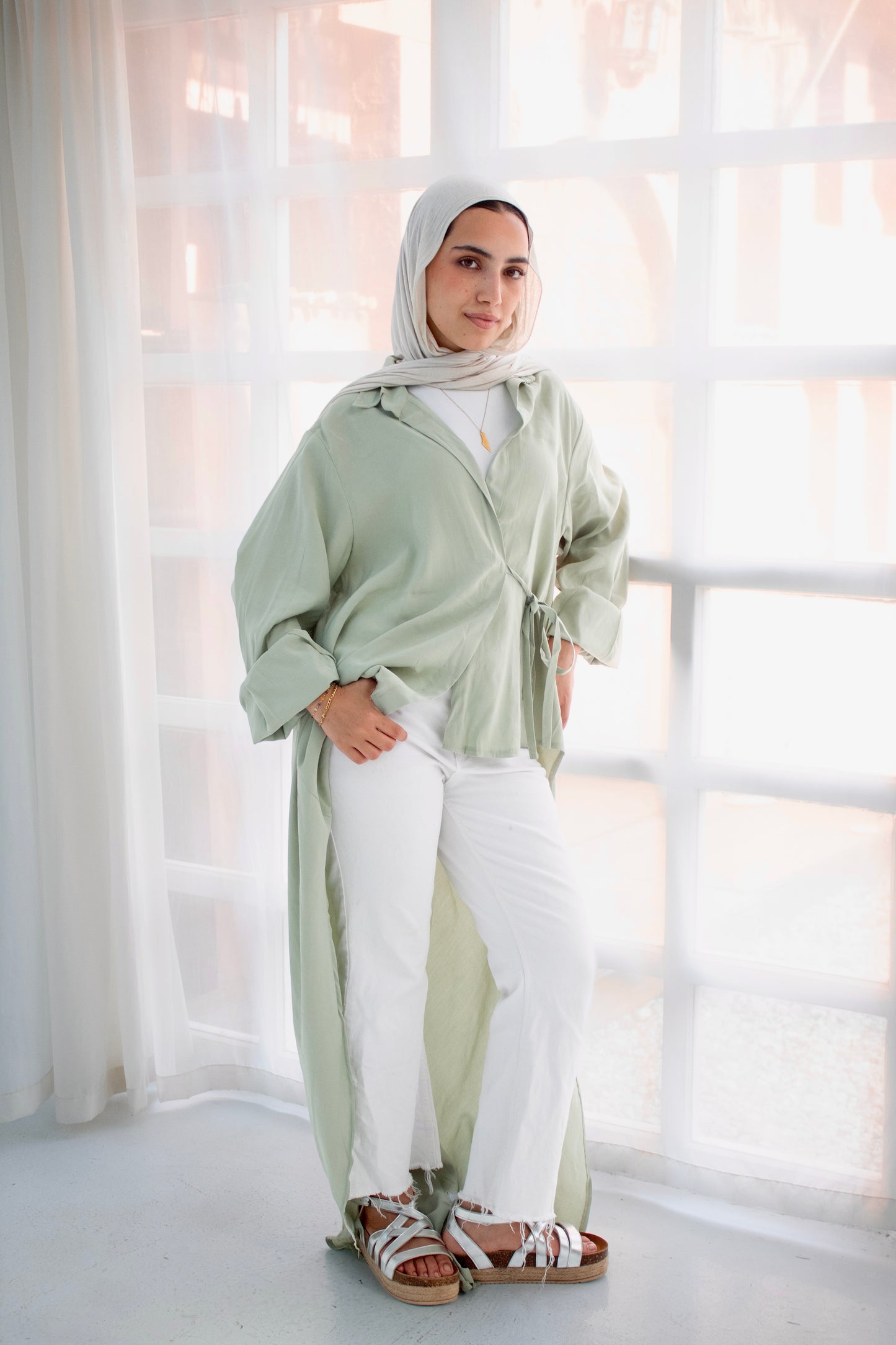 Remo mint green high and low blouse
