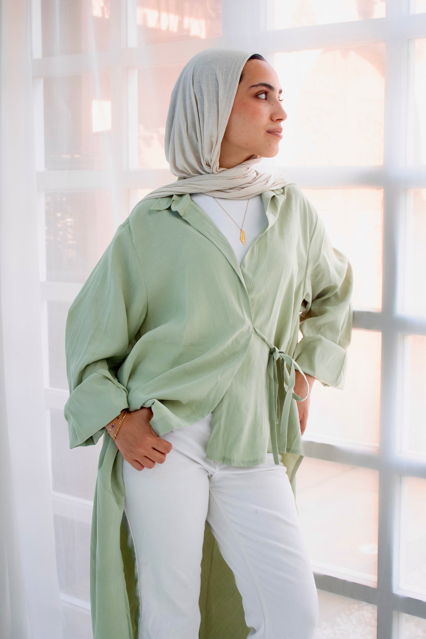Remo mint green high and low blouse