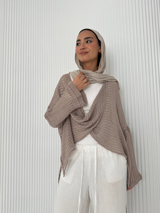 Caffee convoluted high and low knitted top