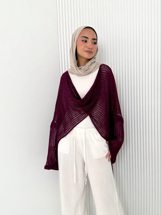 Burgundy convoluted high and low knitted top