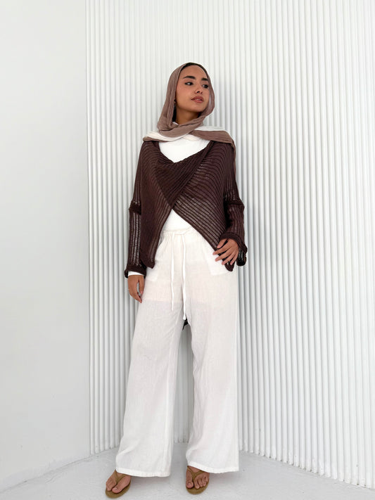 Brown convoluted high and low knitted top