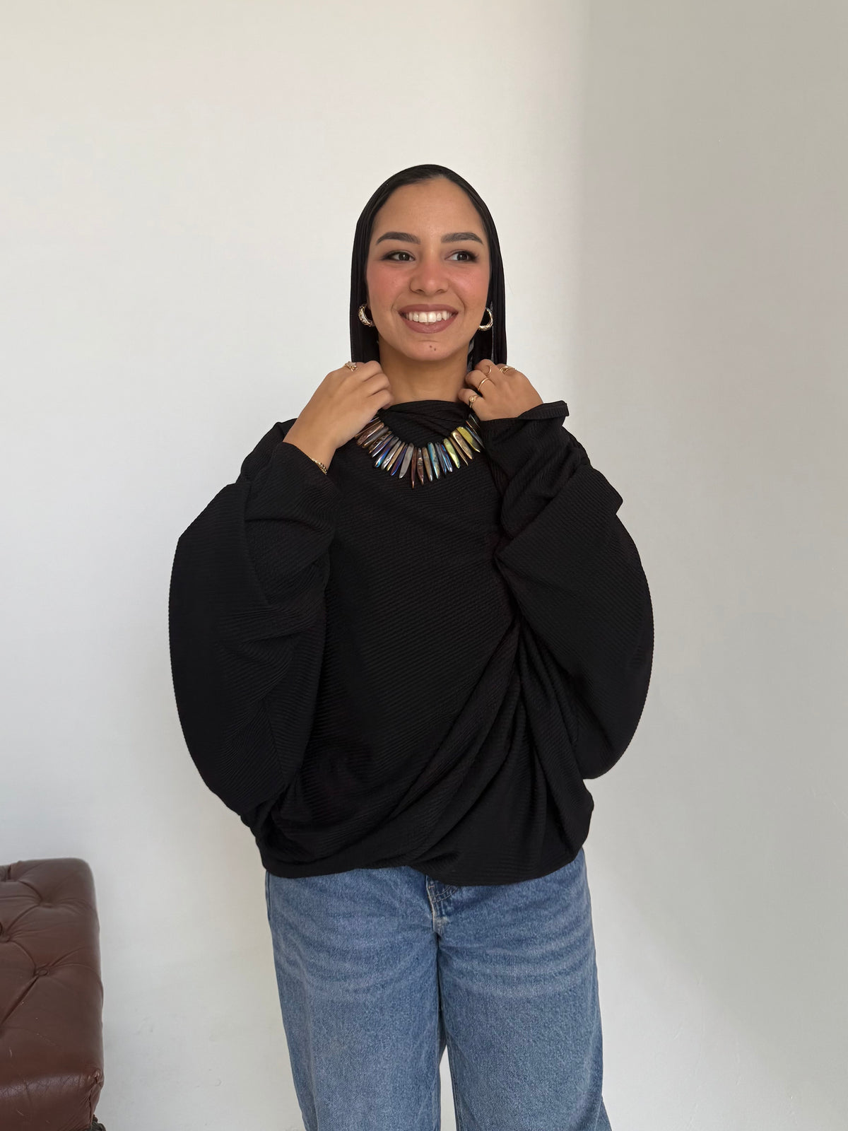 Knitted draping top in black