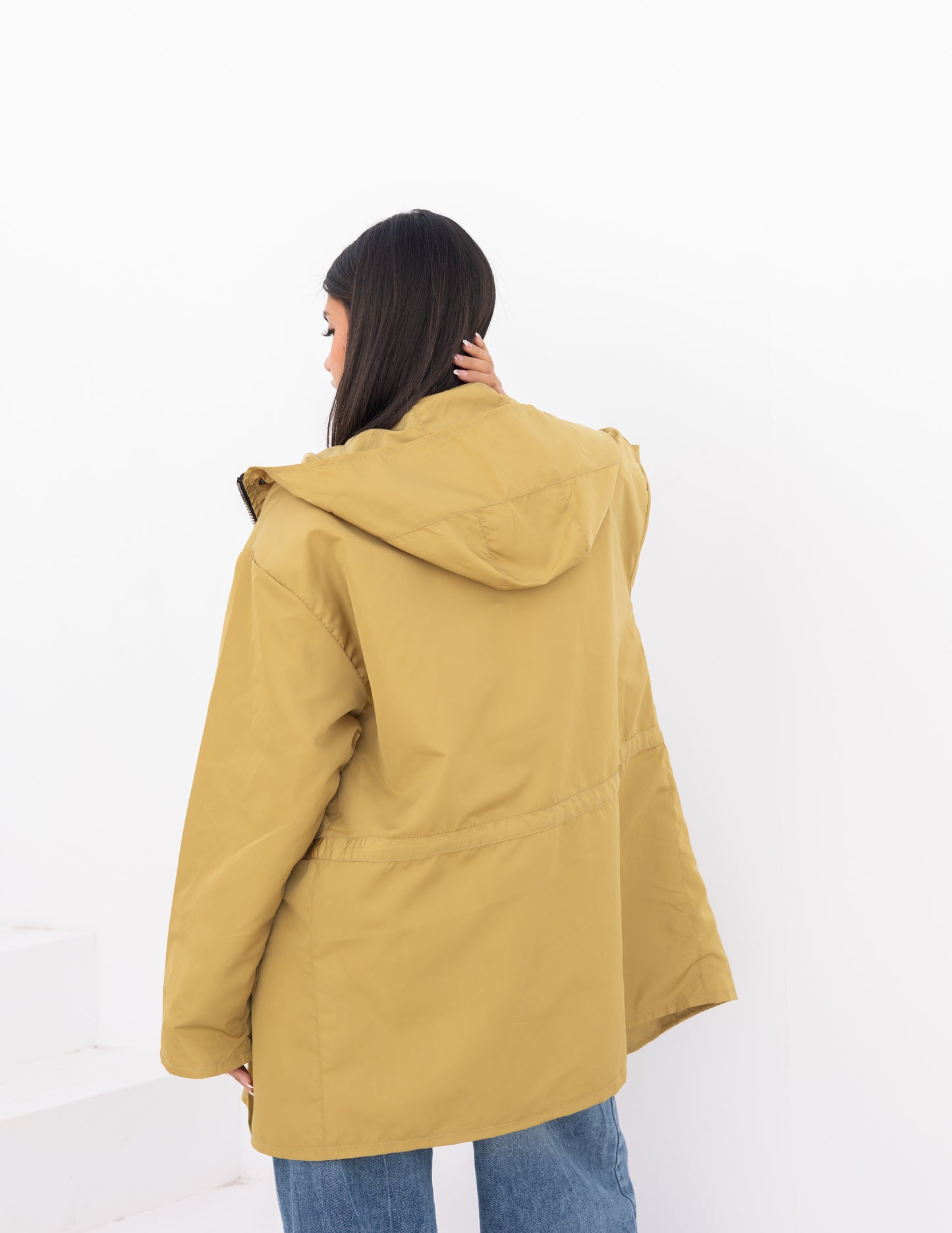 Waterproof jacket in mustard