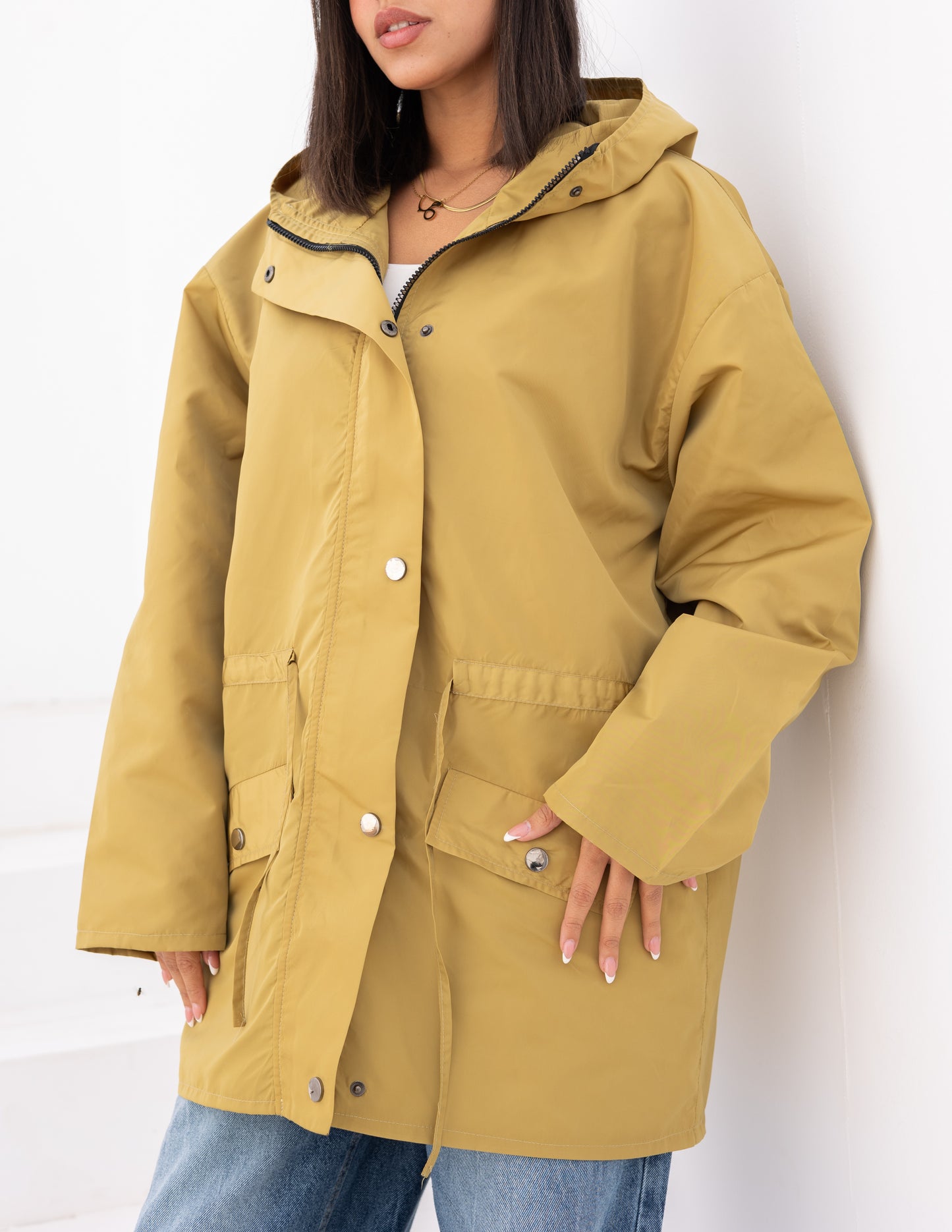 Waterproof jacket in mustard