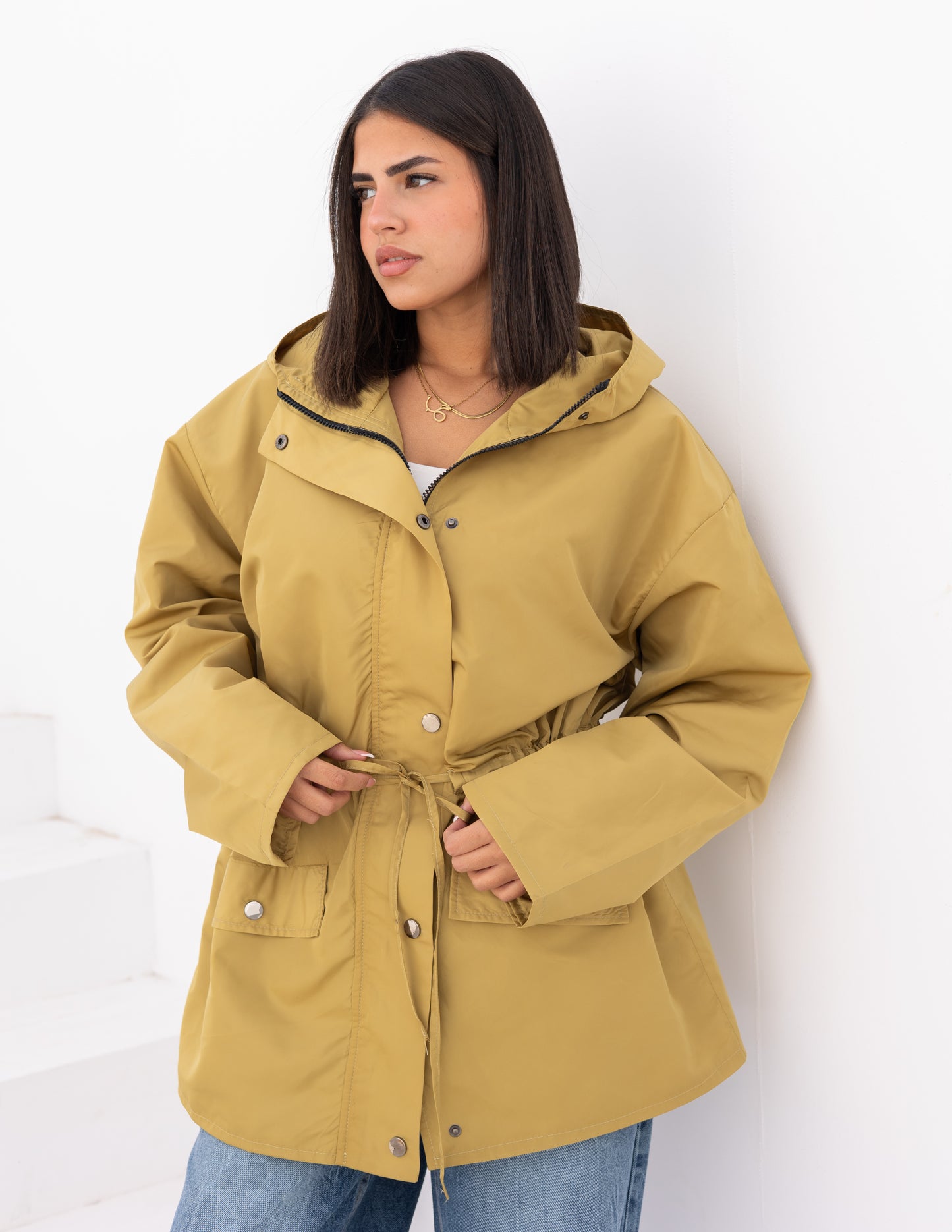 Waterproof jacket in mustard