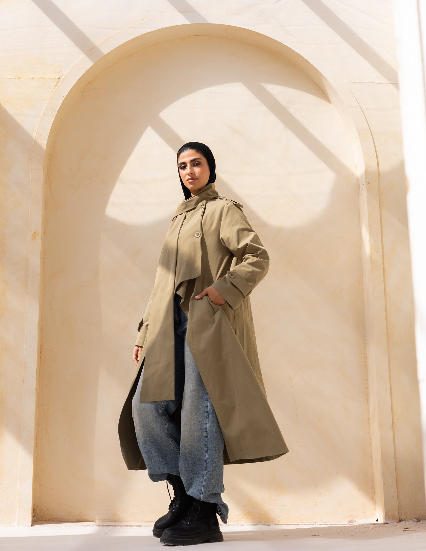 Asymmetric trench coat in olive