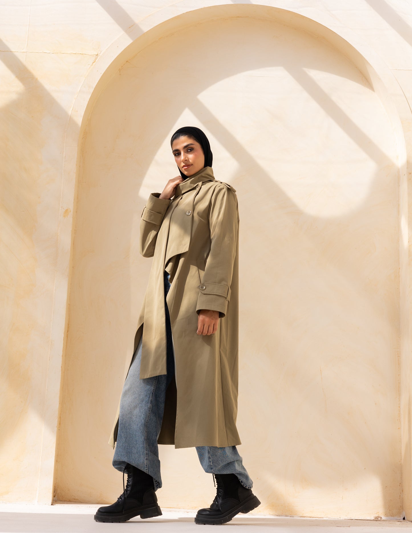 Asymmetric trench coat in olive