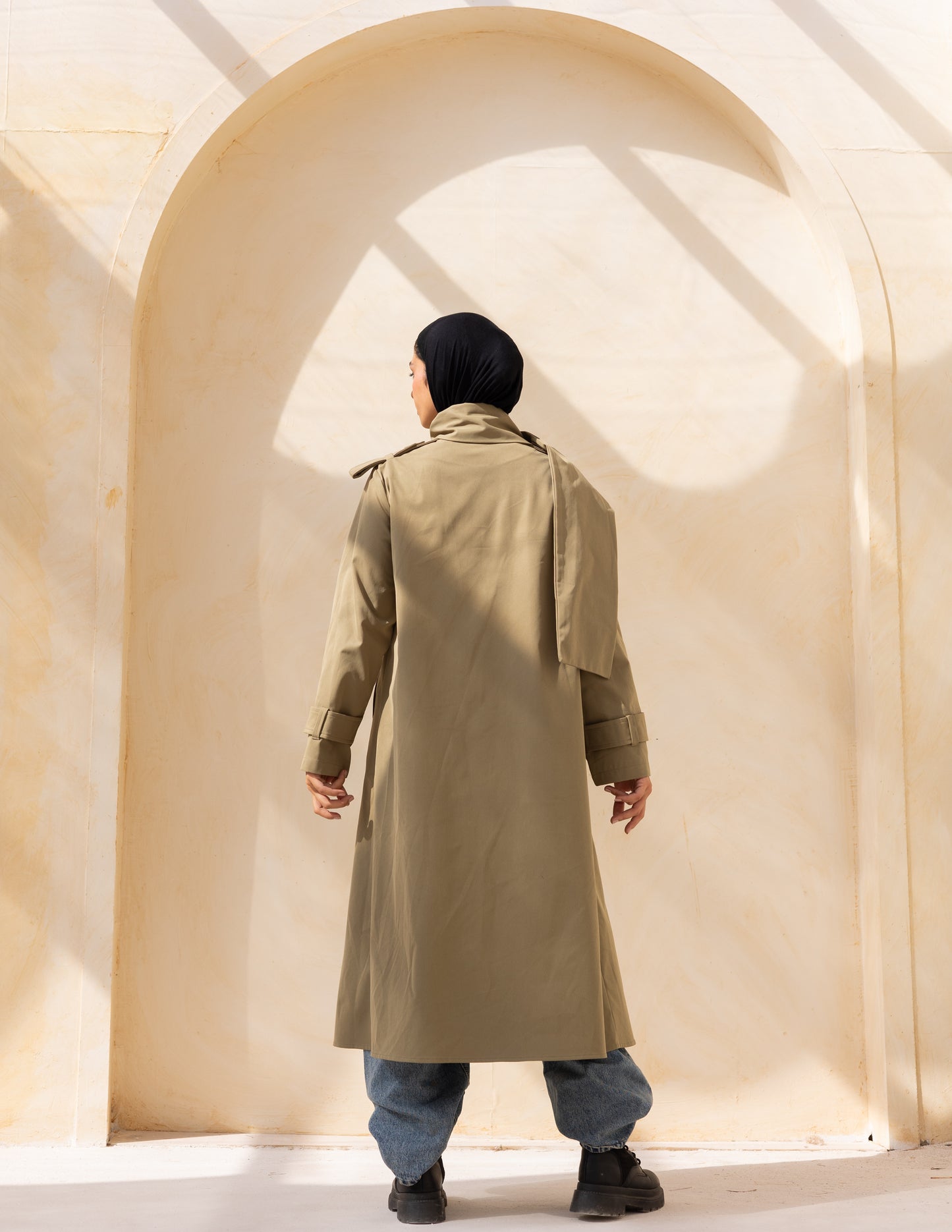 Asymmetric trench coat in olive