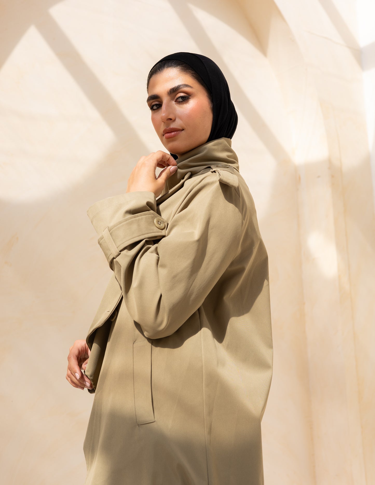 Asymmetric trench coat in olive