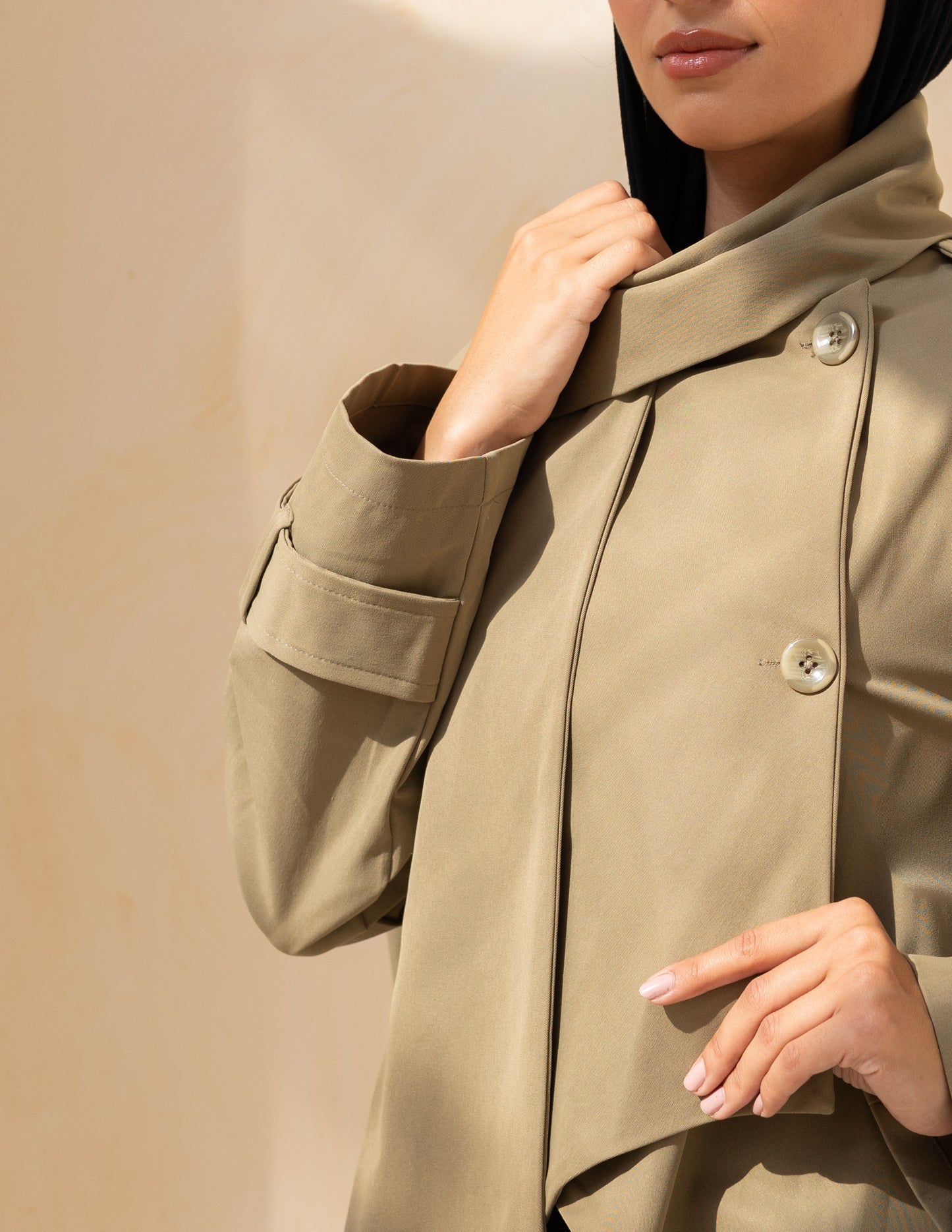 Asymmetric trench coat in olive