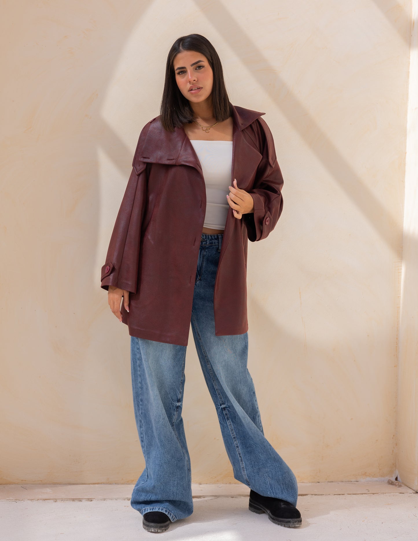 Bold neck stung suede jacket in burgundy