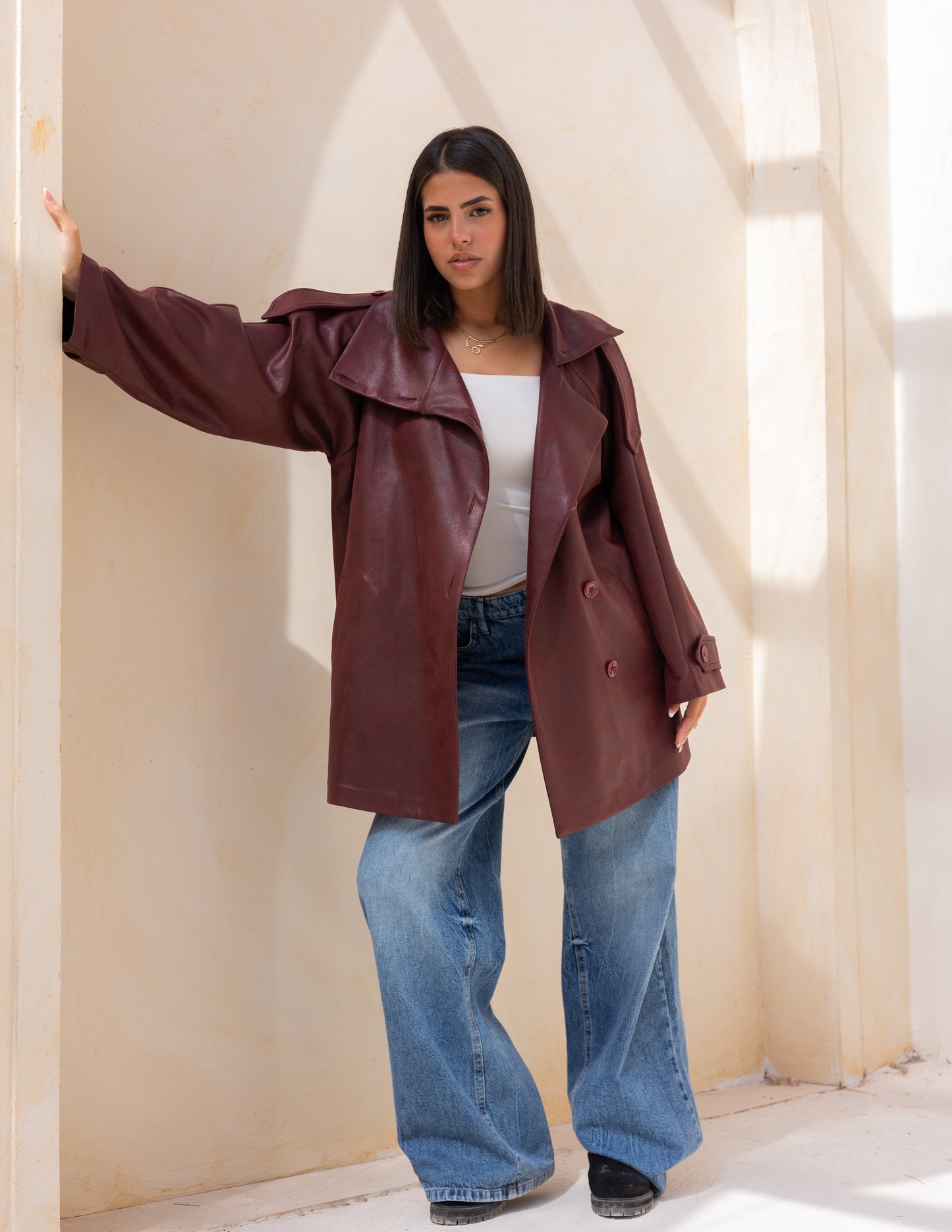 Bold neck stung suede jacket in burgundy