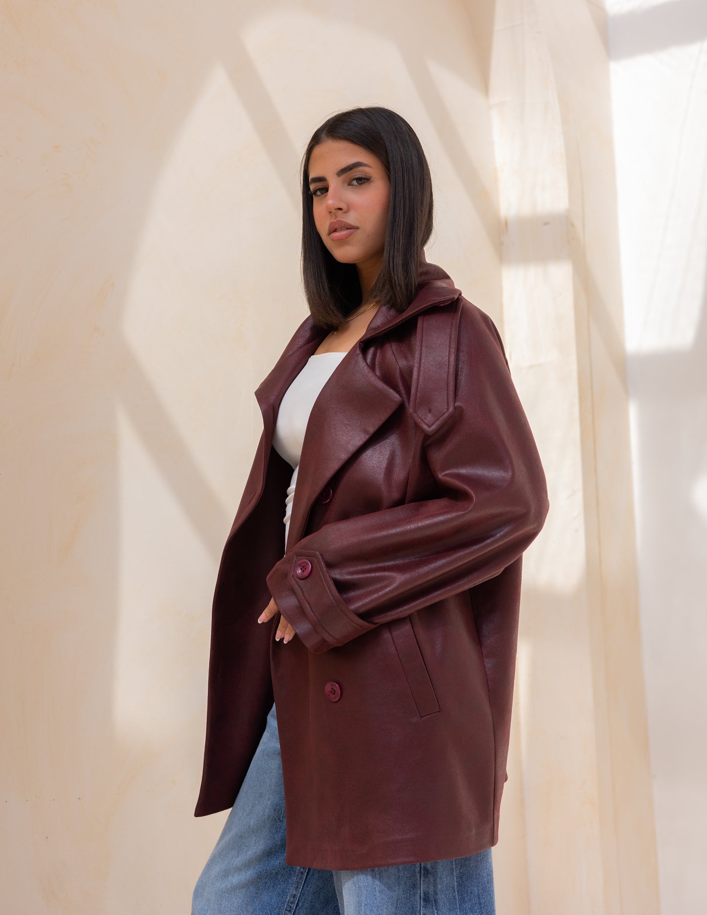 Bold neck stung suede jacket in burgundy