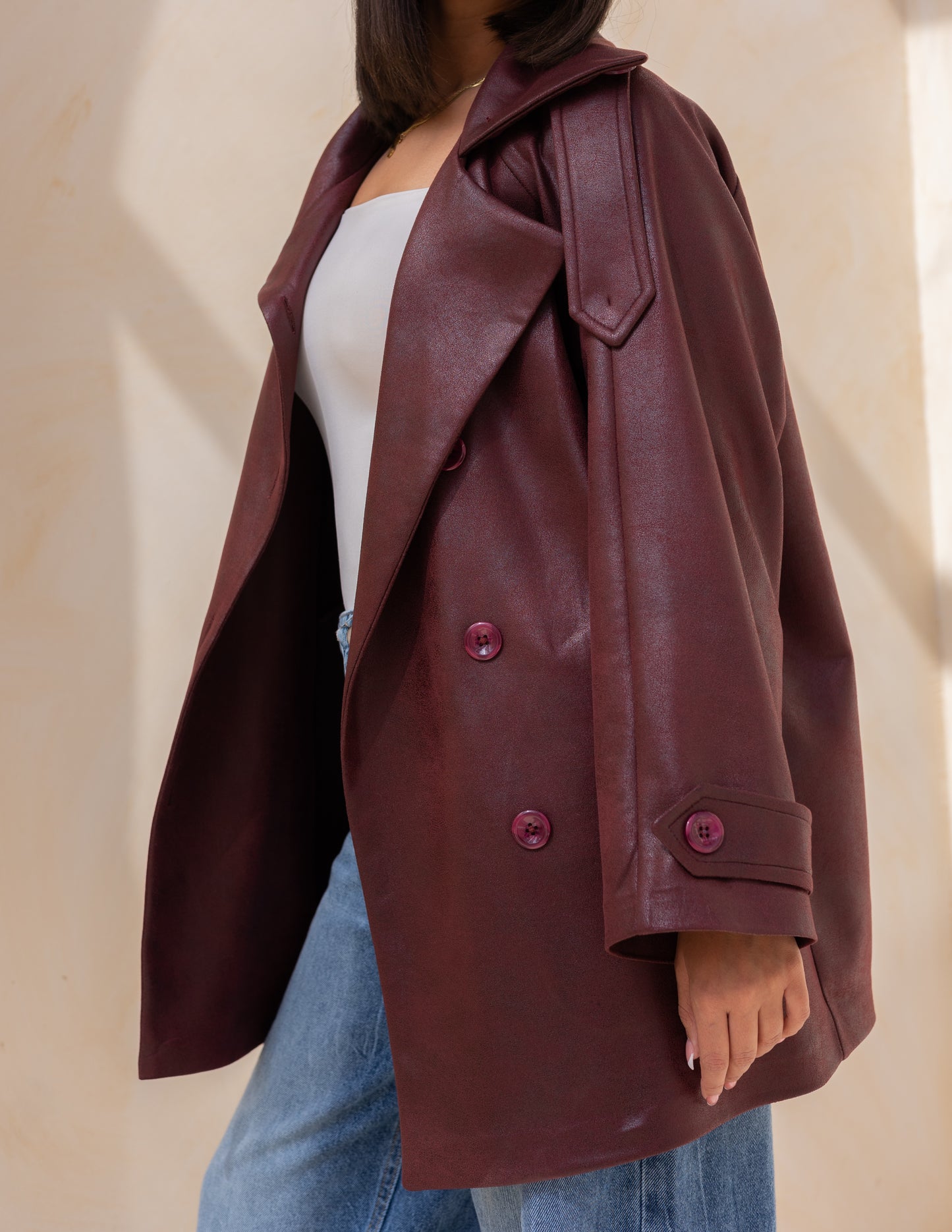 Bold neck stung suede jacket in burgundy