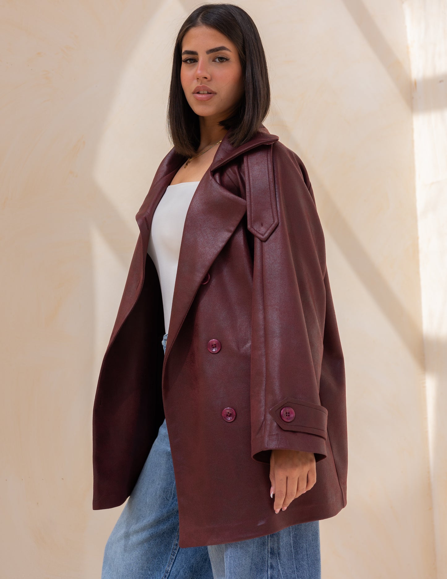 Bold neck stung suede jacket in burgundy