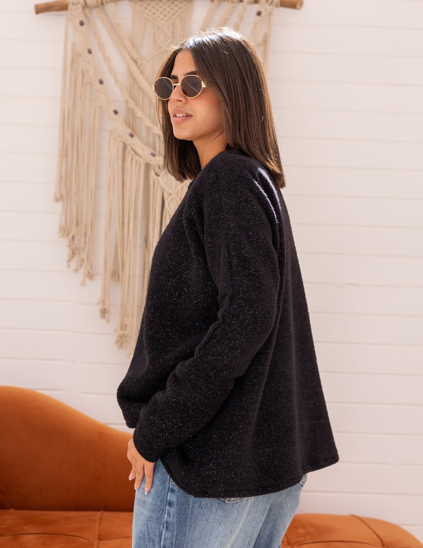 Shimmered knitted cross top in black