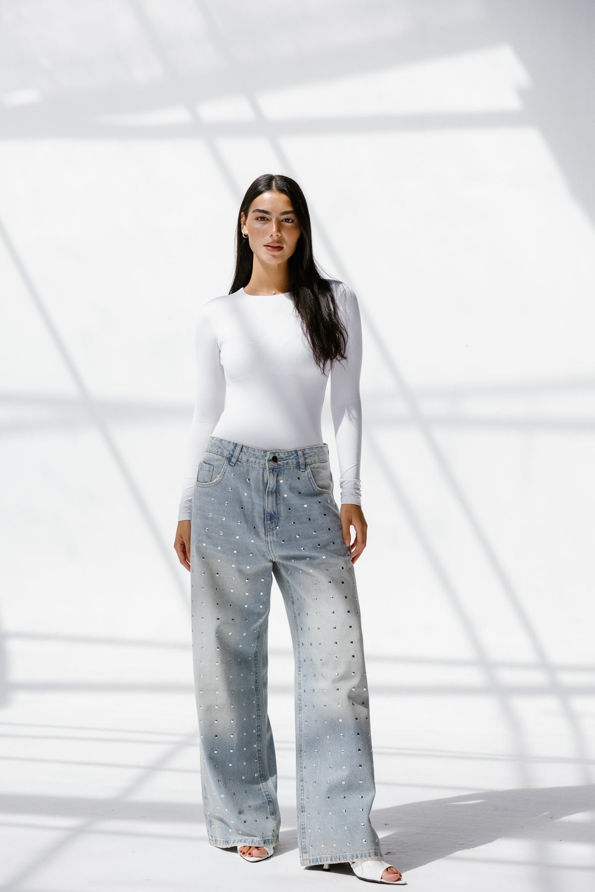 Twist Wide- leg denim pants Studs