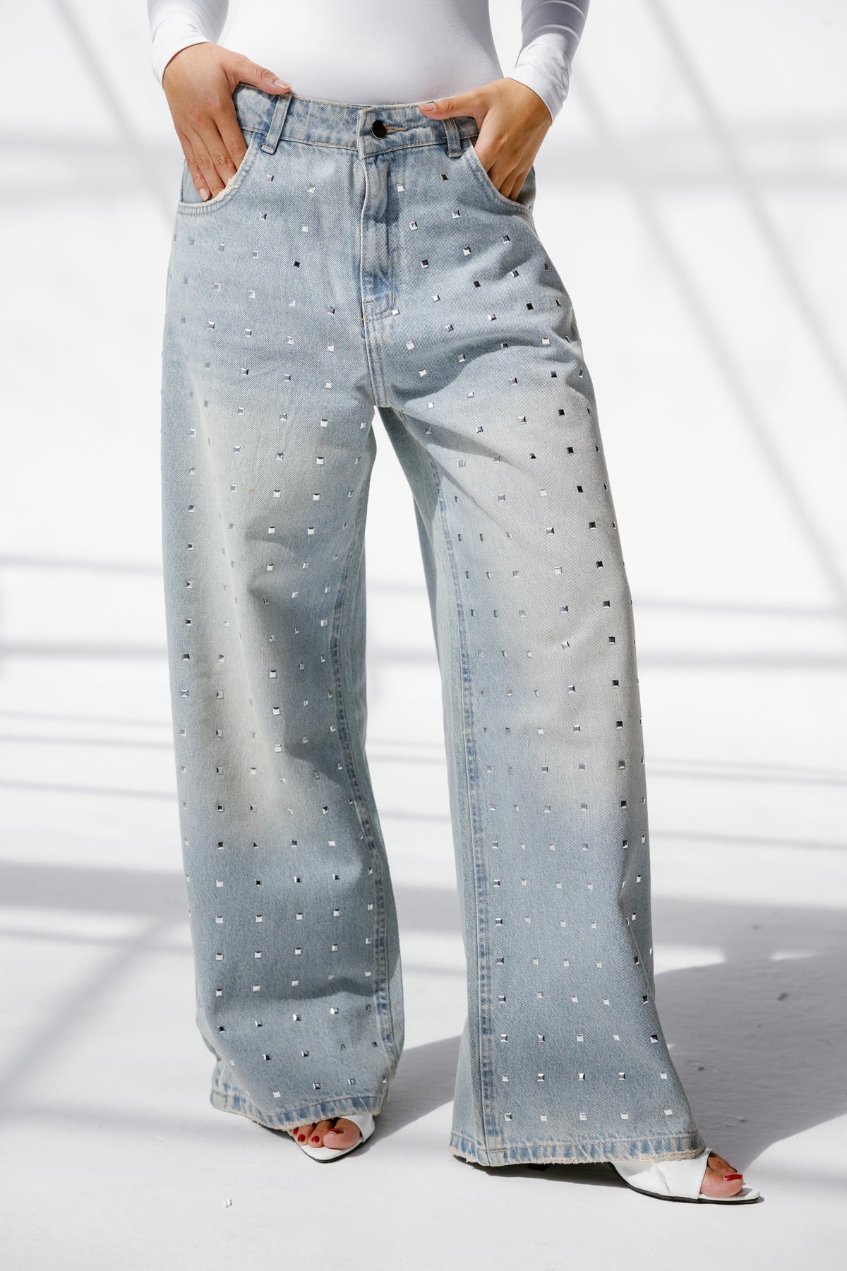 Twist Wide- leg denim pants Studs