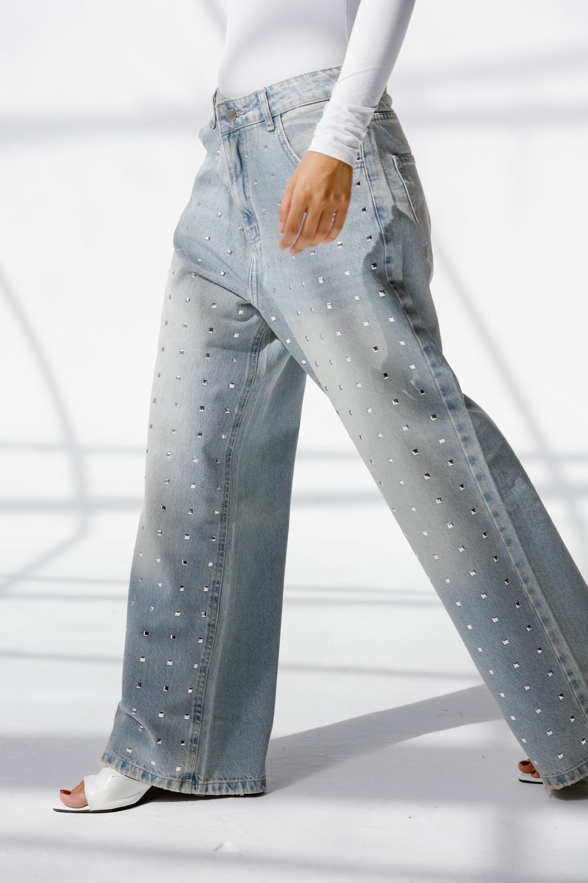 Twist Wide- leg denim pants Studs