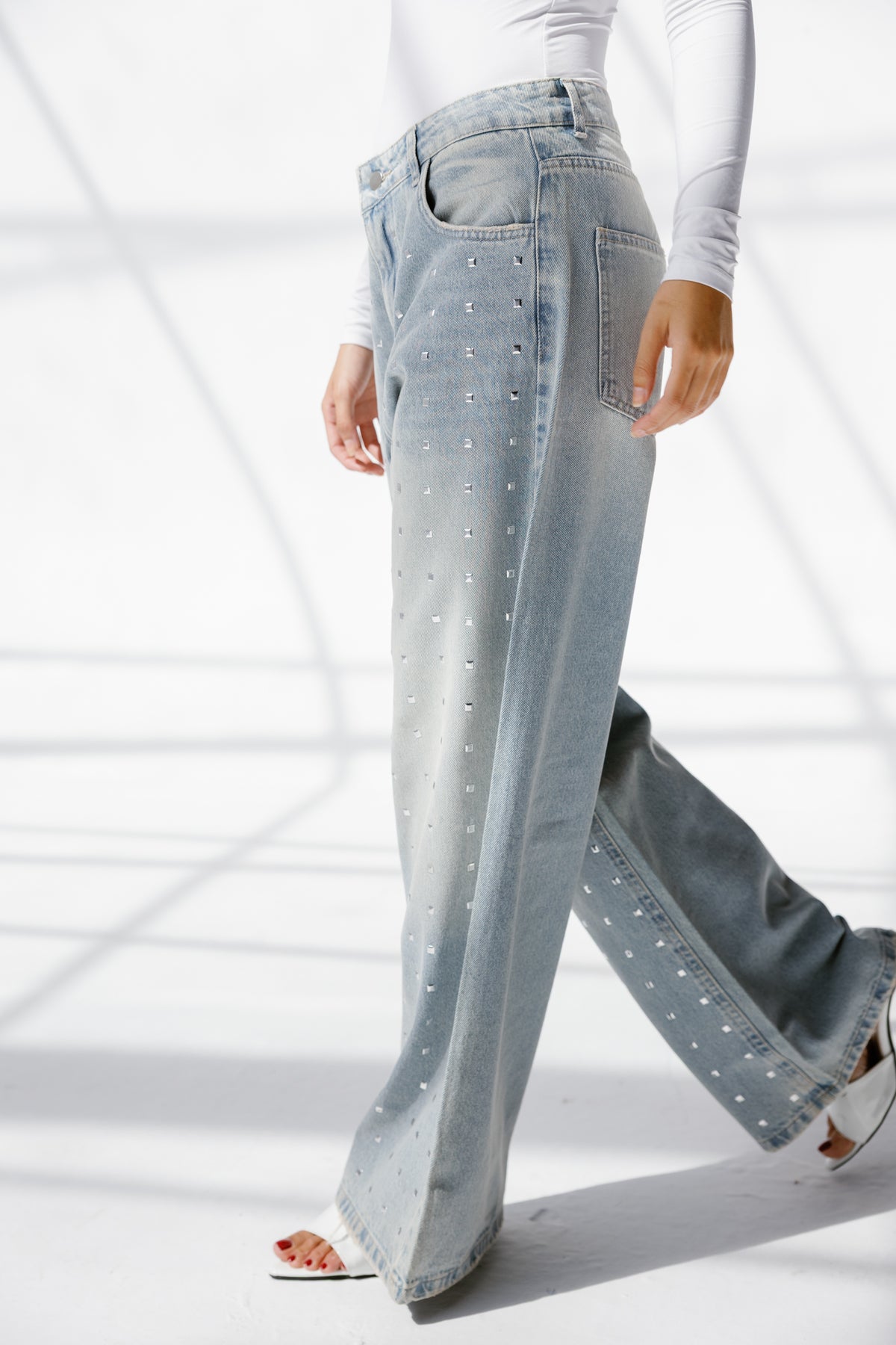 Twist Wide- leg denim pants Studs
