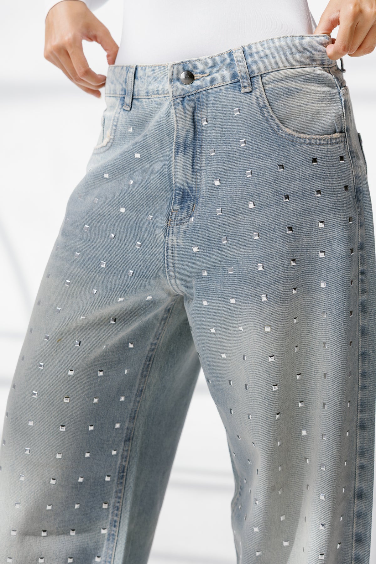 Twist Wide- leg denim pants Studs
