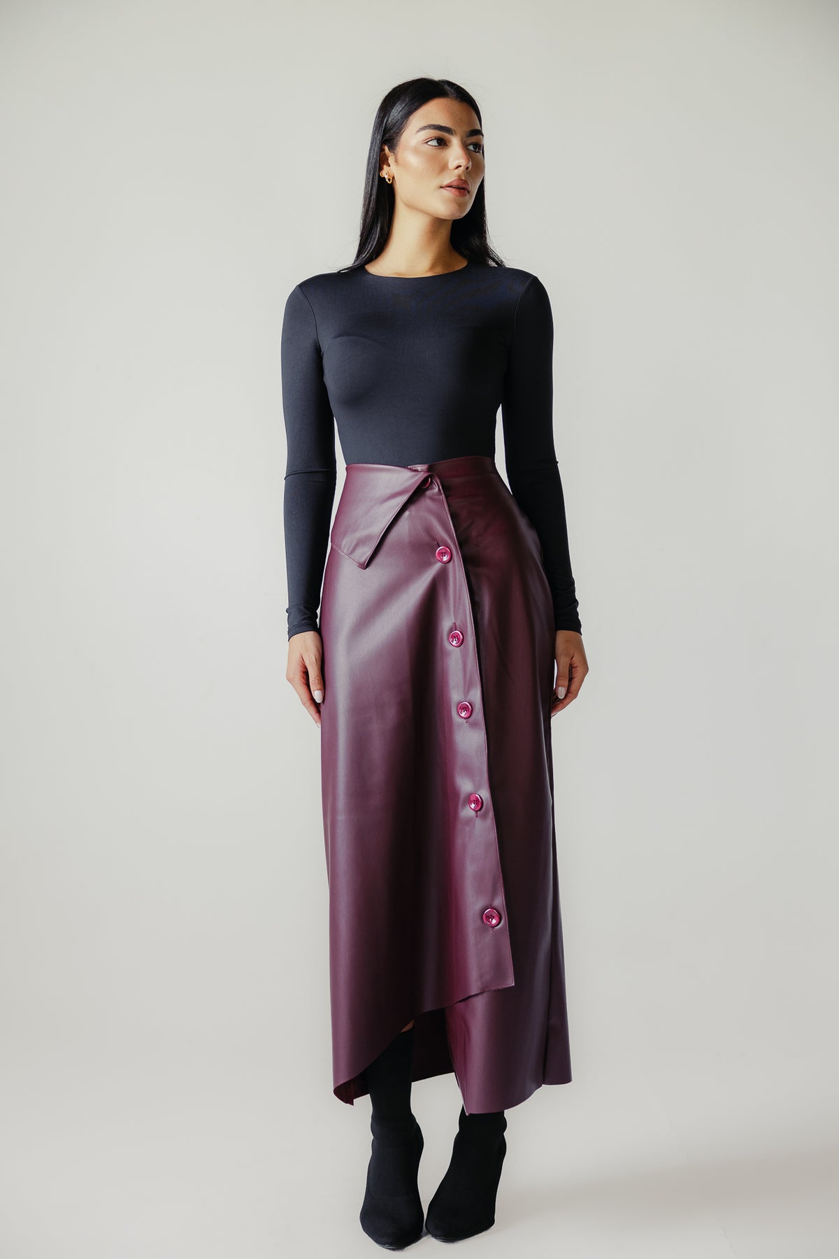Asymmetrical leather skirt in Burgundy