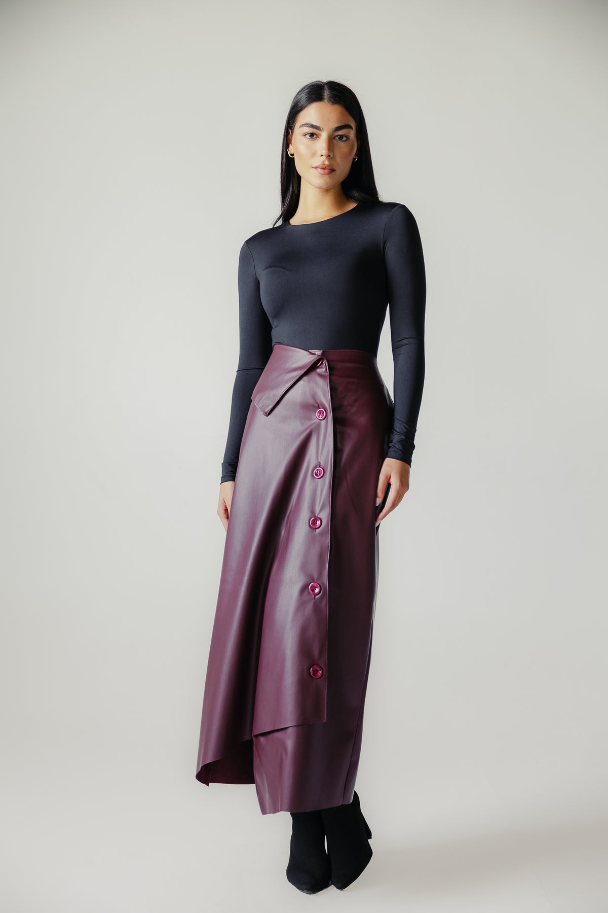 Asymmetrical leather skirt in Burgundy