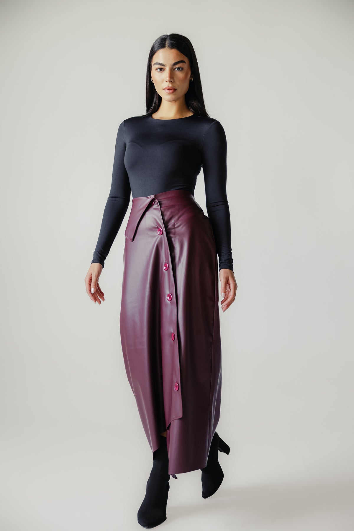 Asymmetrical leather skirt in Burgundy
