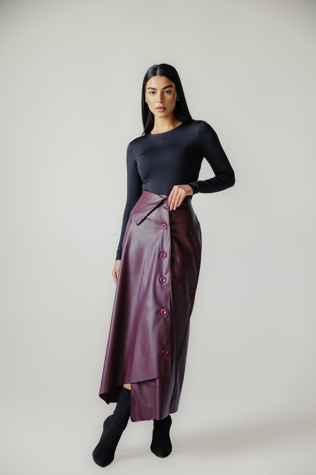 Asymmetrical leather skirt in Burgundy