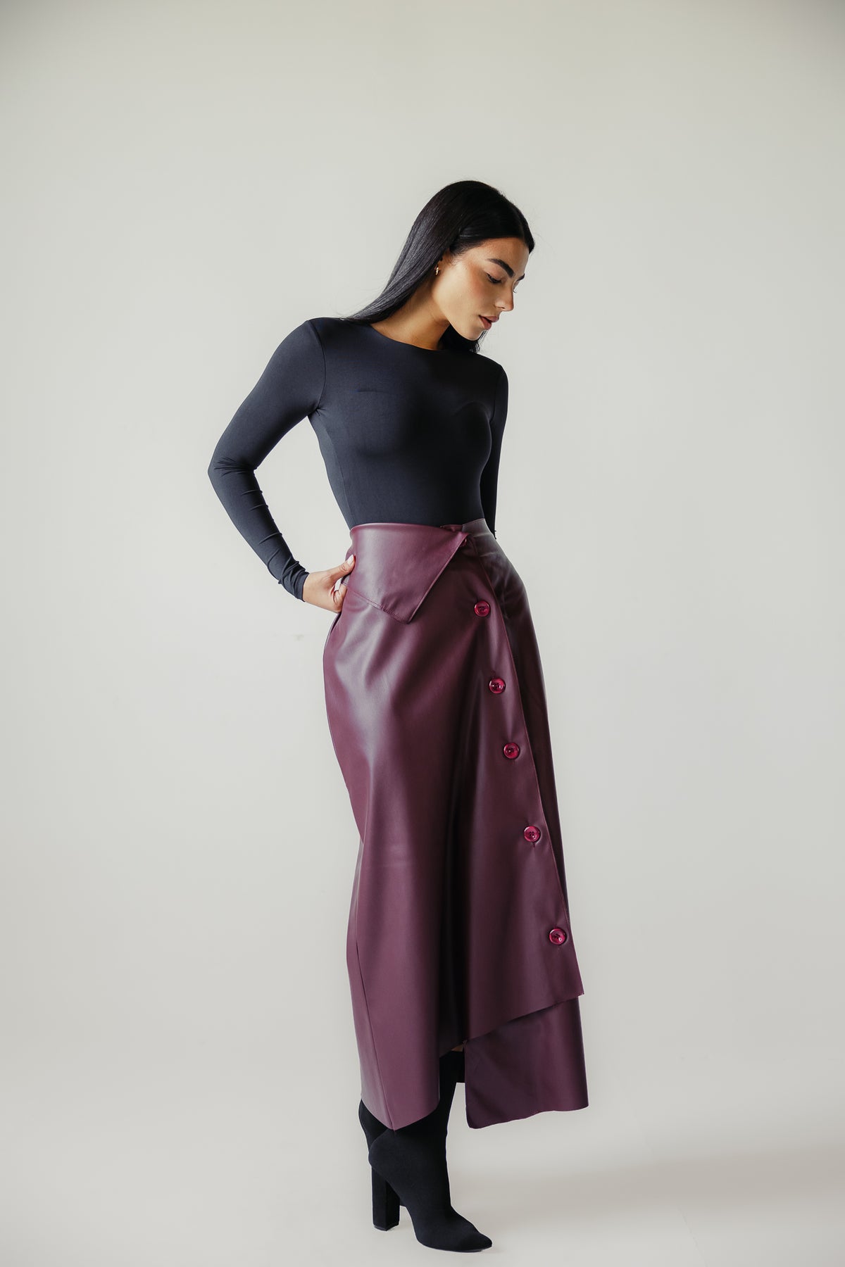 Asymmetrical leather skirt in Burgundy