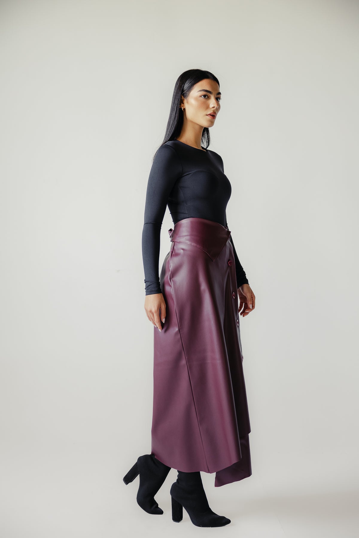 Asymmetrical leather skirt in Burgundy