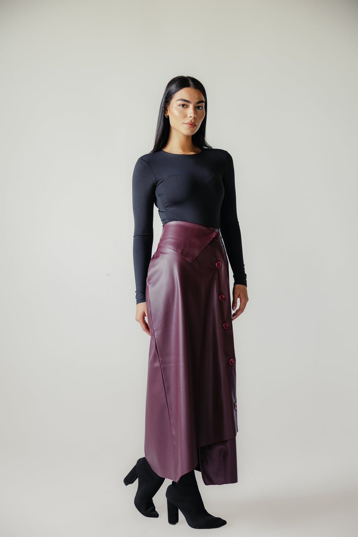 Asymmetrical leather skirt in Burgundy