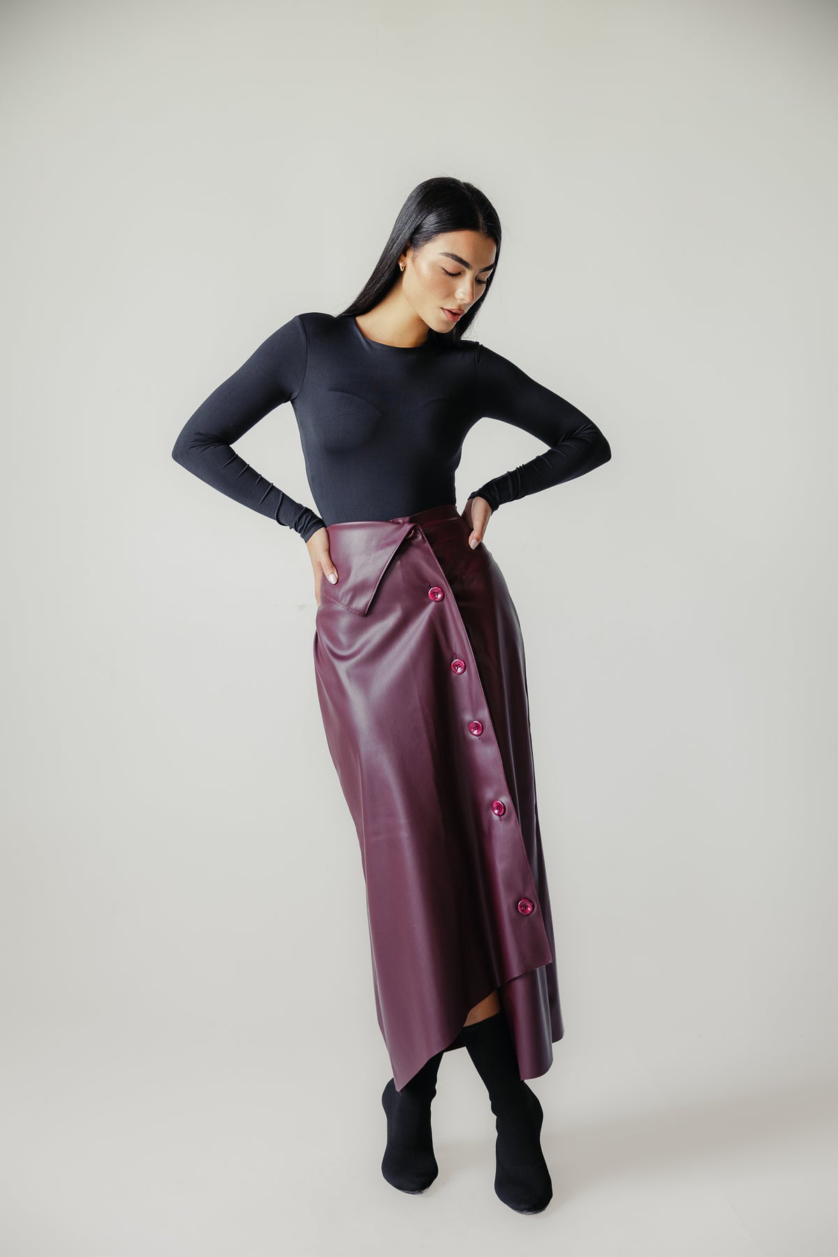 Asymmetrical leather skirt in Burgundy