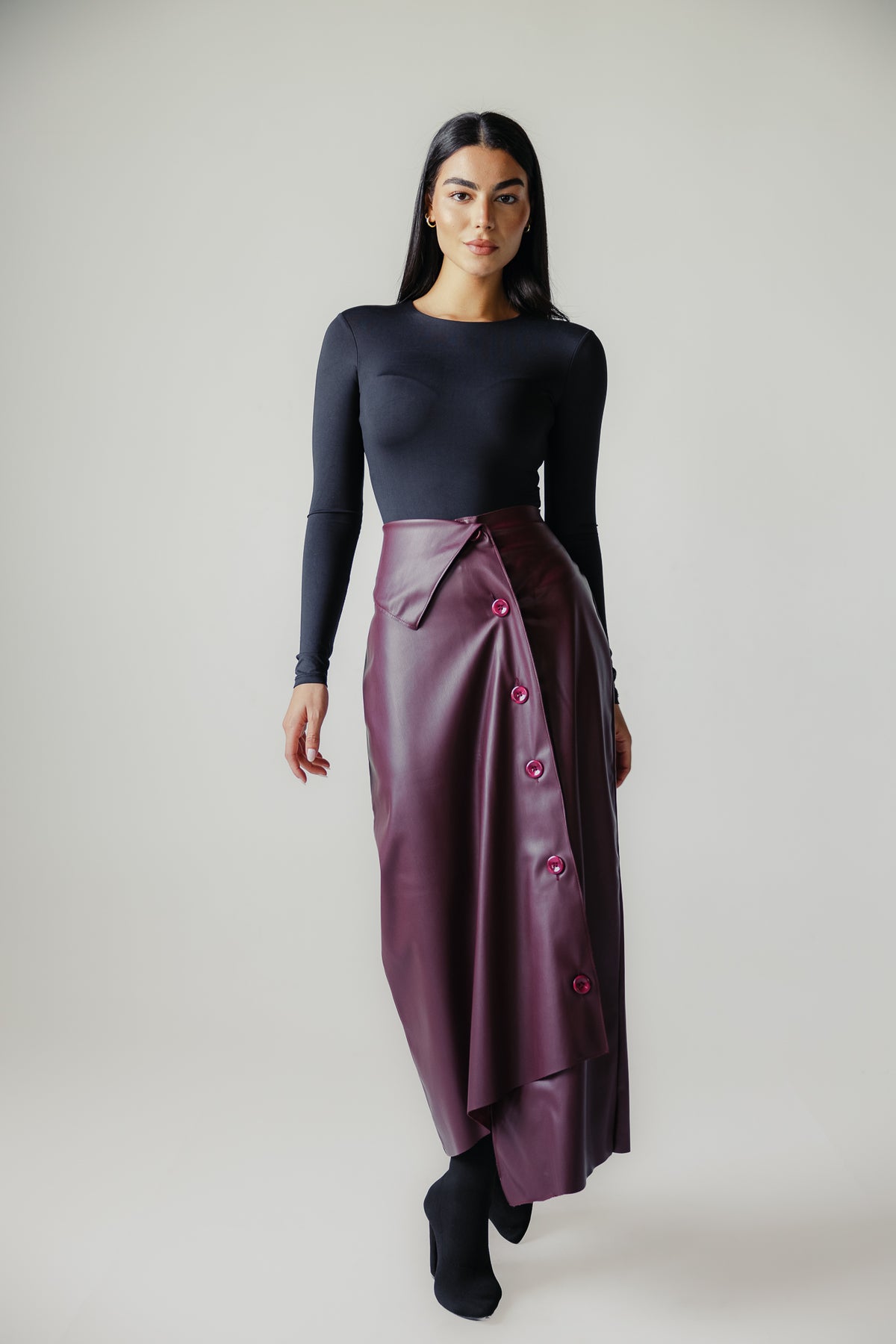 Asymmetrical leather skirt in Burgundy